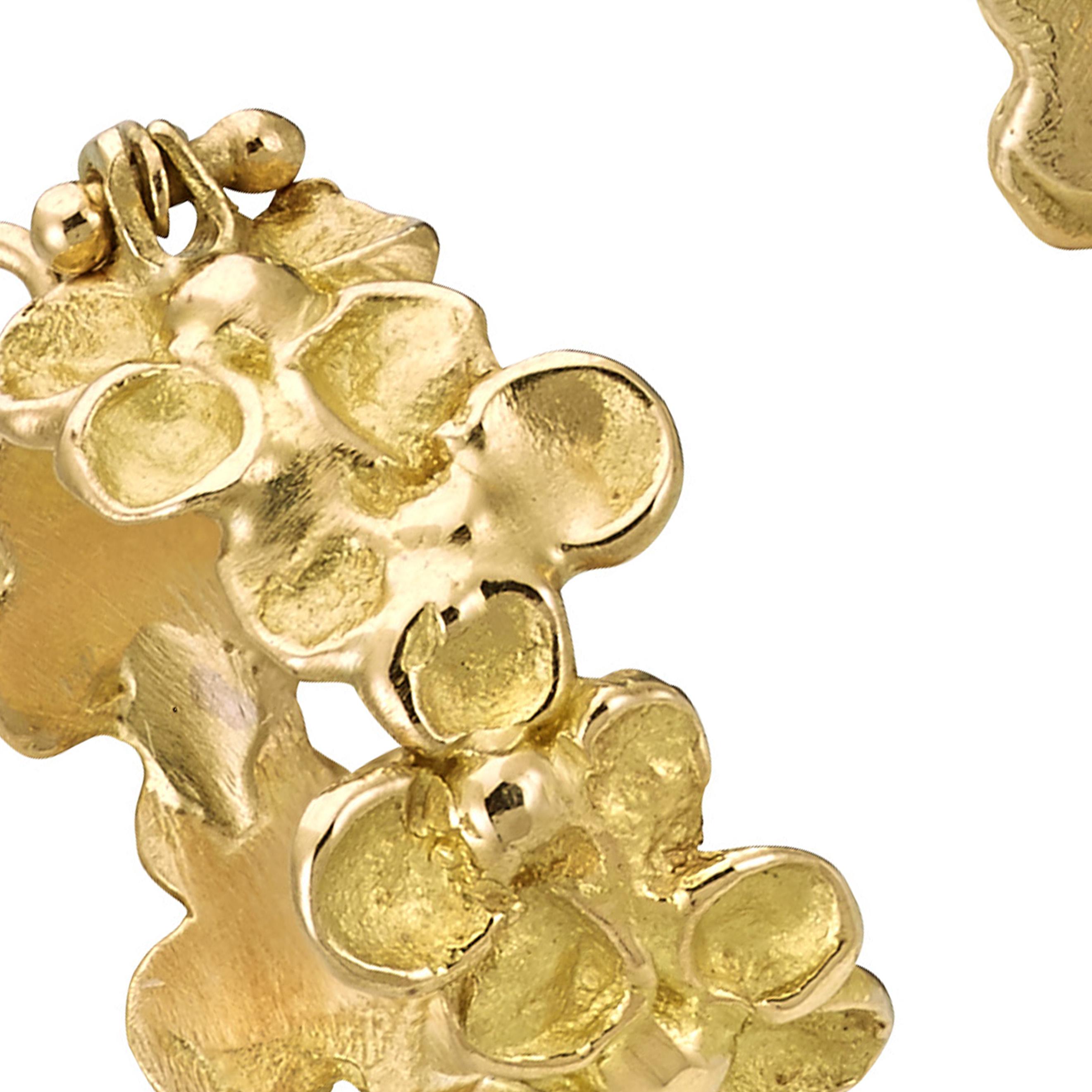 Contemporary Anais Rheiner 18 Karat Yellow Gold Textured Flower Hoop Earrings For Sale