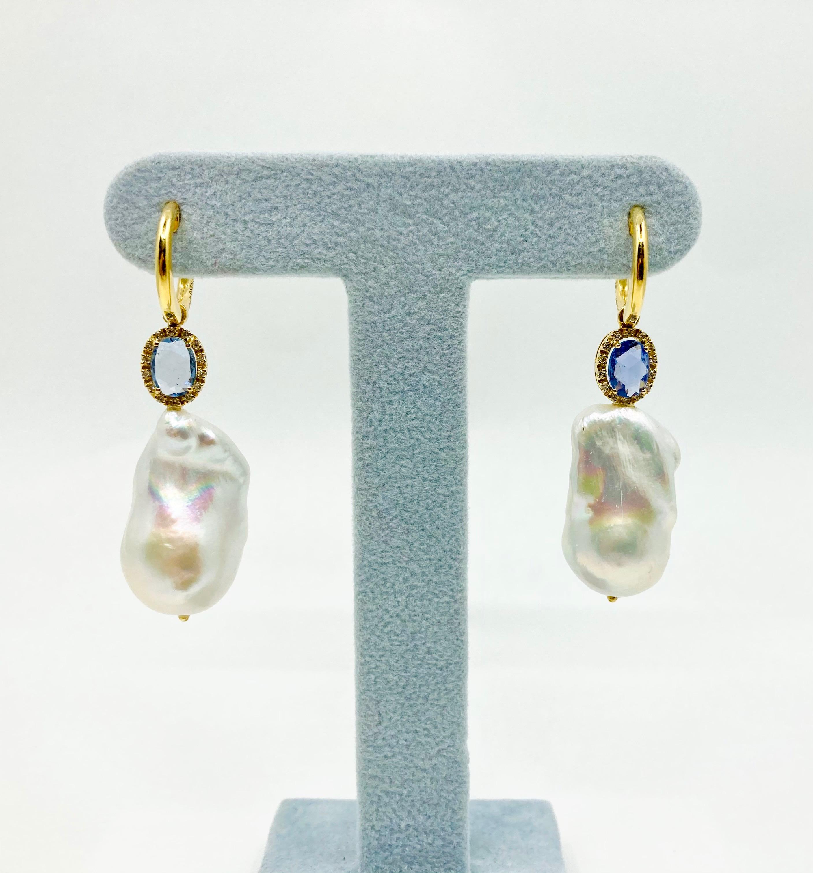 Timeless and elegant Yellow Gold earrings, with Baroque Pearl gr. 5.19, Oval Sapphire ct. 1.41 and Diamonds ct. 0.15, Made in Italy by Roberto Casarin. 

The irregular yet elegant shape of Baroque Pearls makes everything they are mounted on a unique