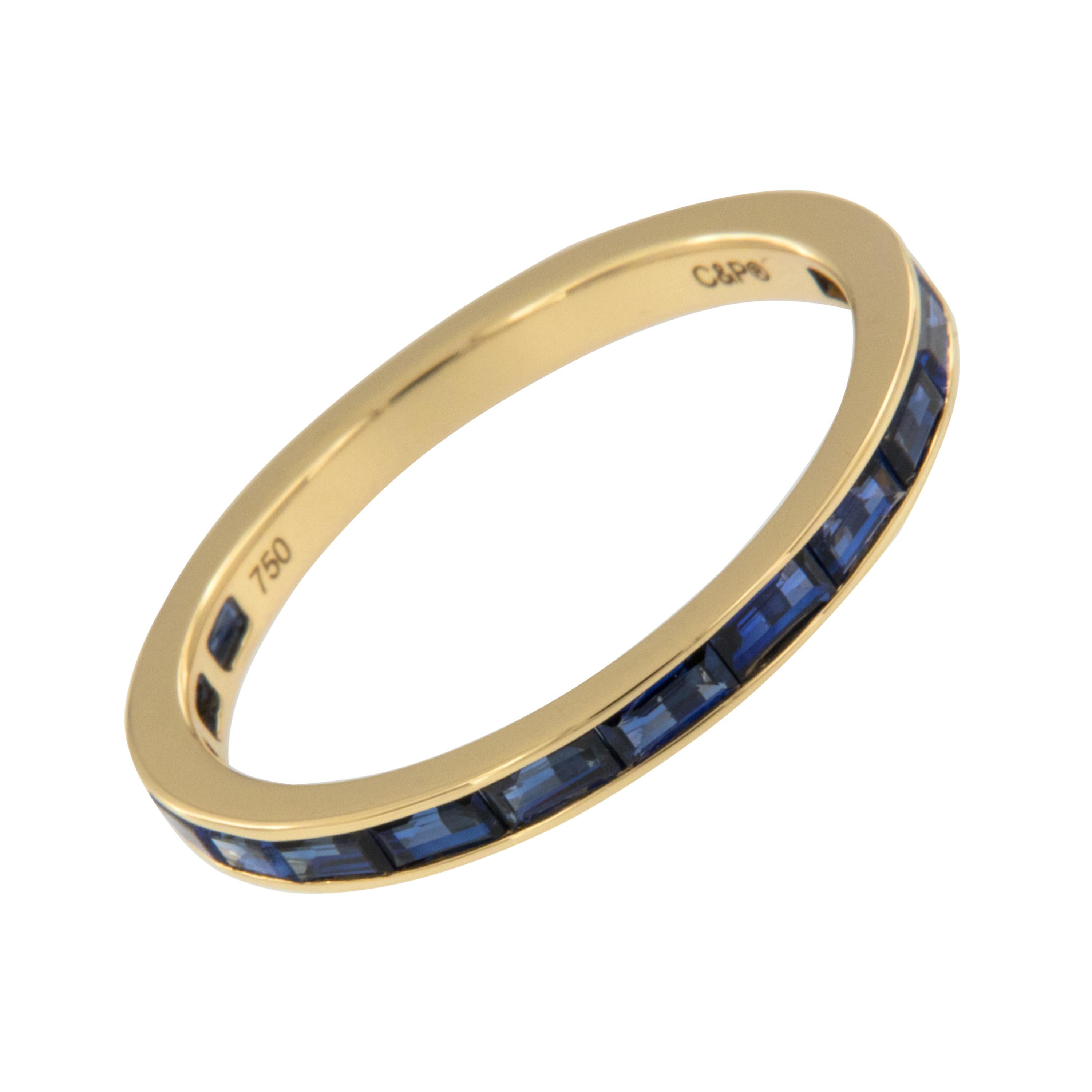 Expertly crafted in royal 18 karat yellow gold this timeless baguette cut blue sapphire eternity band is a perfect addition to an existing engagement ring, for wearing alone and also looks fantastic stacked! 20 baguette cut fine quality blue