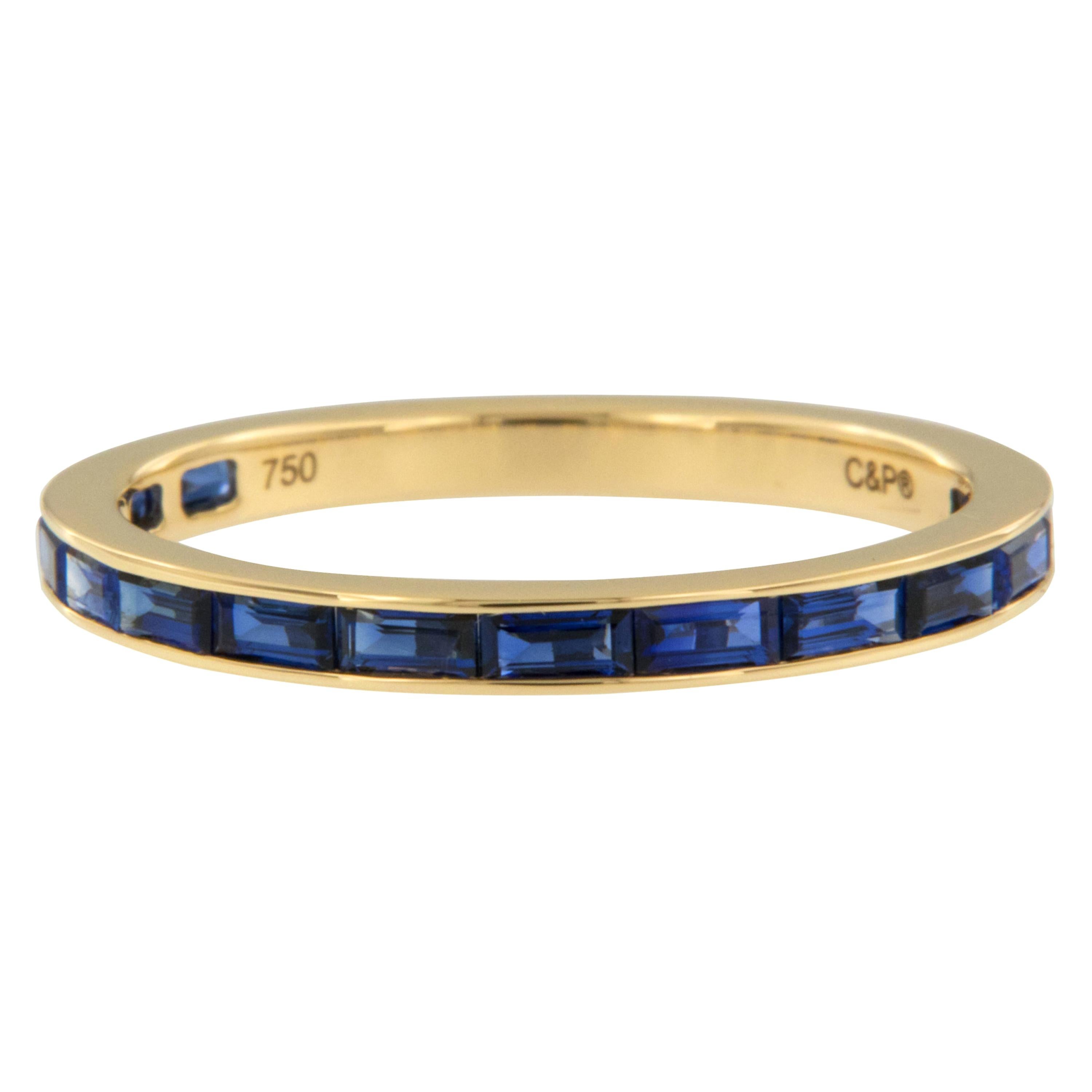 18 Karat Yellow Gold East-West Style Baguette Blue Sapphire Eternity Band Ring