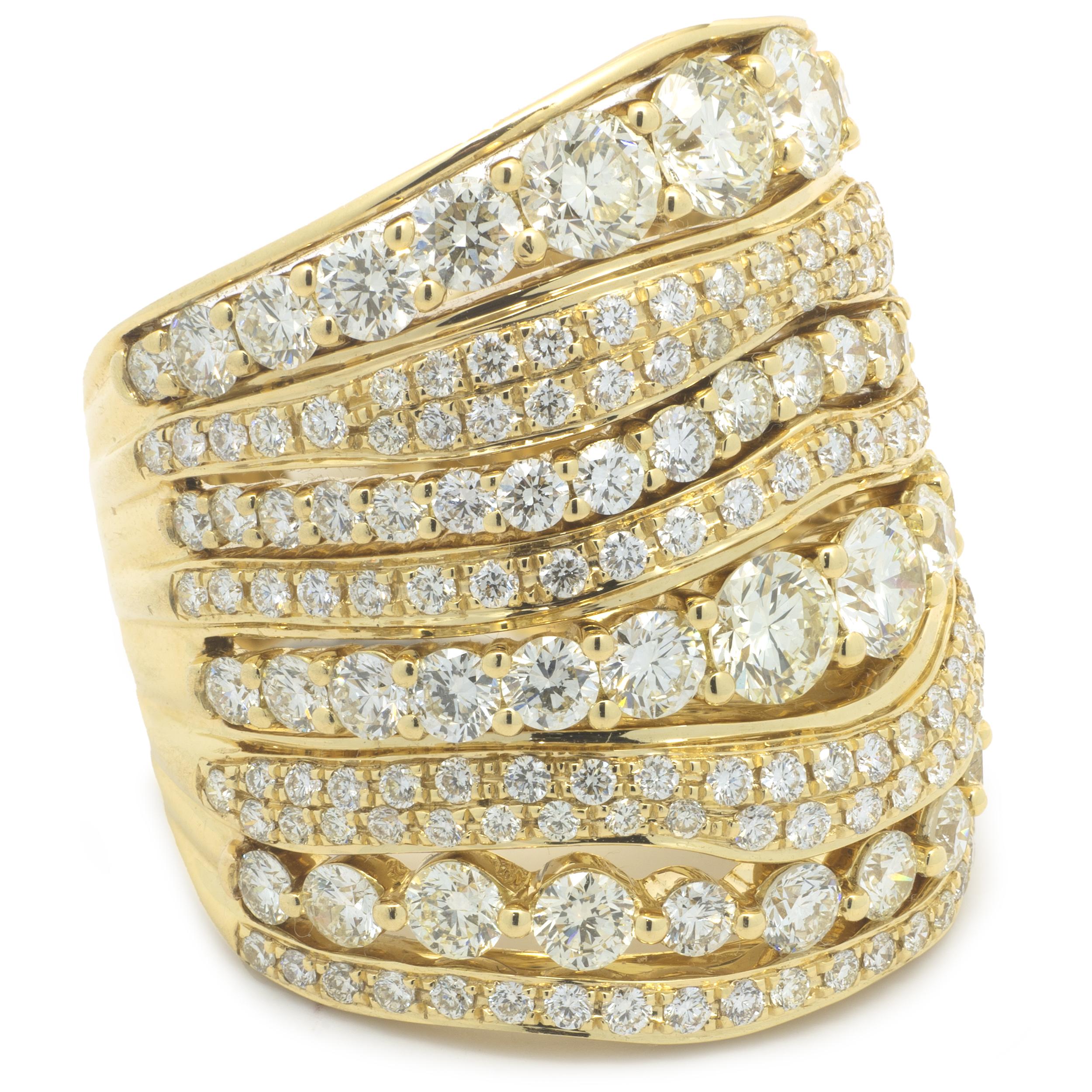 Designer: custom
Material: 18K yellow gold
Diamond:  202 round brilliant cut = 4.64cttw
Color: J
Clarity: VS2
Ring size: 7 (please allow two additional shipping days for sizing requests)
Weight:  16.93 grams
