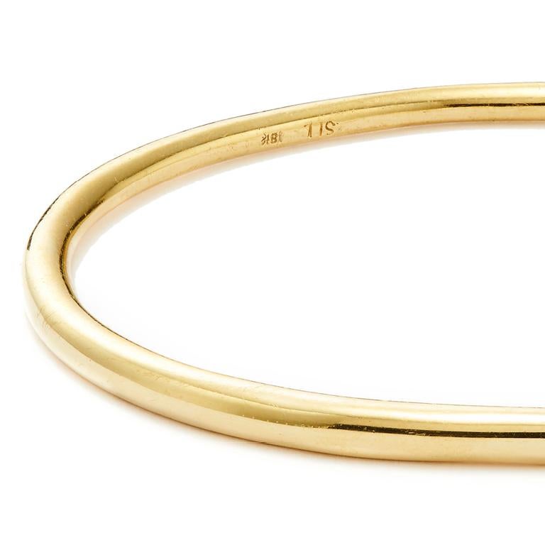 The epitome of sleek and versatile design, Susan Lister Locke's Elliptical Bangles—in 18 Karat Yellow Gold, 14 Karat Rose Gold or Sterling Silver—are sleek whether worn solo or layered. Slip on one, two or three to complement any outfit.

Layer