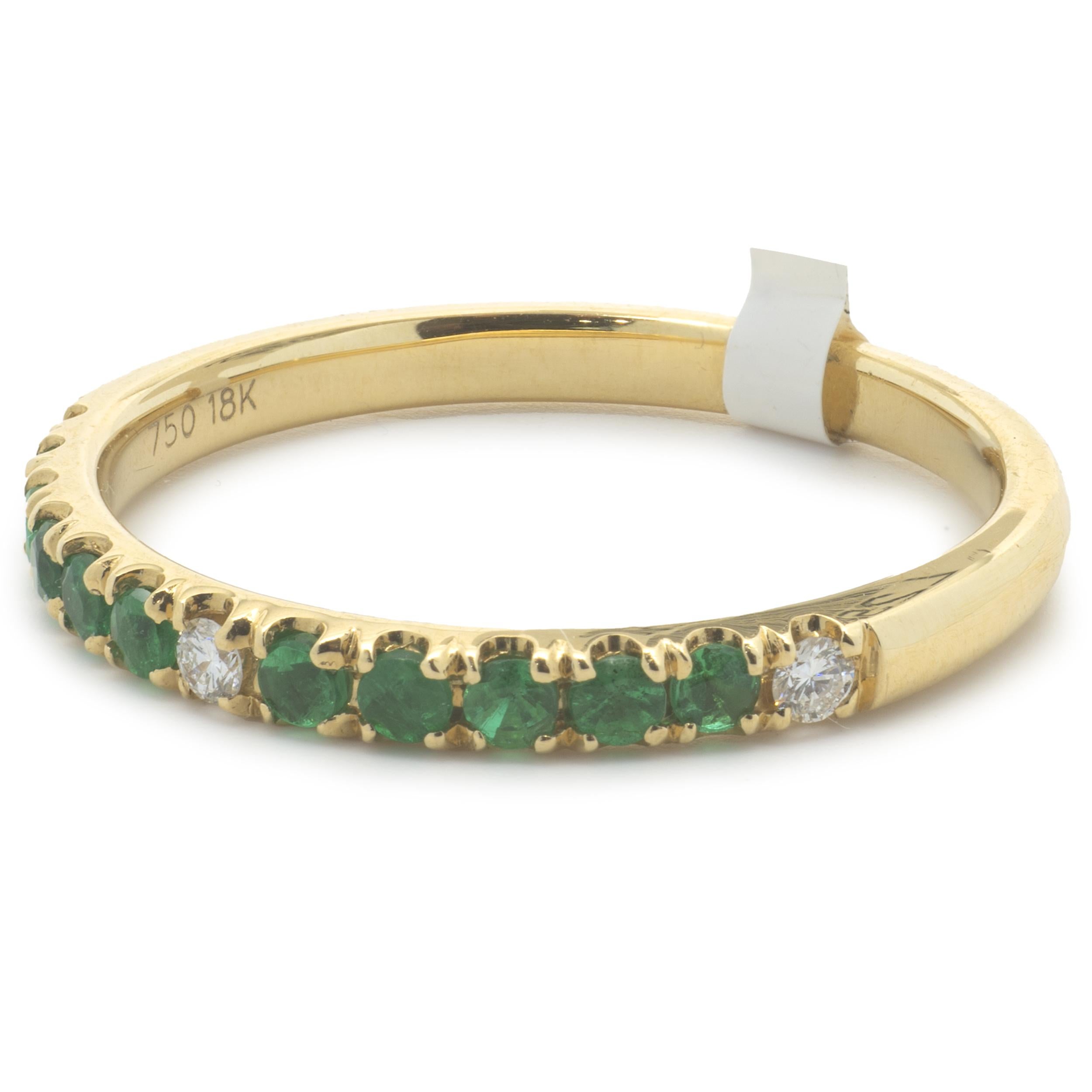 Material: 18K yellow gold
Diamond: 3 round brilliant cut = .06cttw
Color: G
Clarity: VS2
Emerald: 10 round cut = .24cttw
Ring Size: 7 (please allow up to 2 additional business days for sizing requests)
Dimensions: ring top measures 2.30mm
Weight: