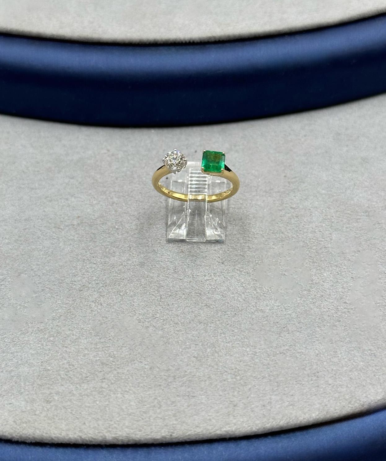 Women's or Men's 18 Karat Yellow Gold Emerald and Diamond Bypass Ring For Sale