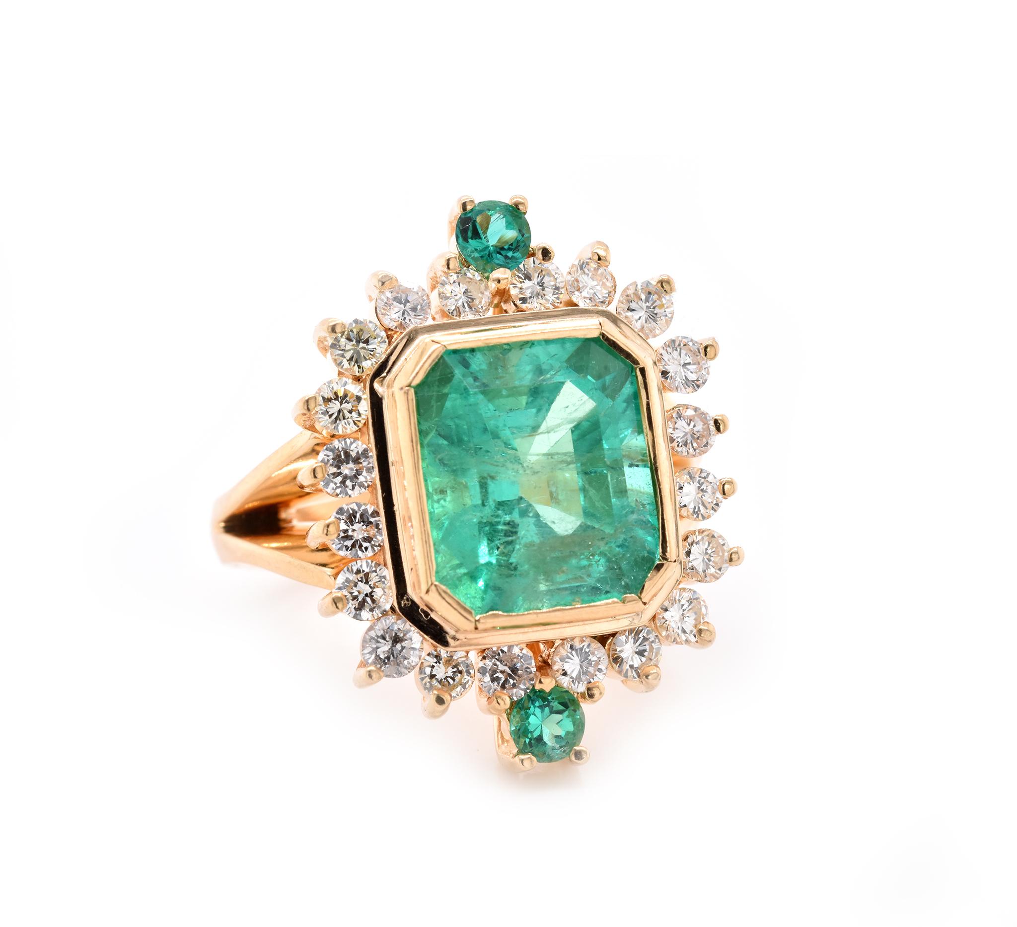 Designer: custom 
Material: 18K yellow gold
Gemstone: Emerald = 8.37ct
Diamond: 20 round brilliant cut = 1.60cttw
Color: G/H
Clarity: SI
Ring Size: 8 (please allow up to 2 additional business days for sizing requests)
Dimensions: ring top measures