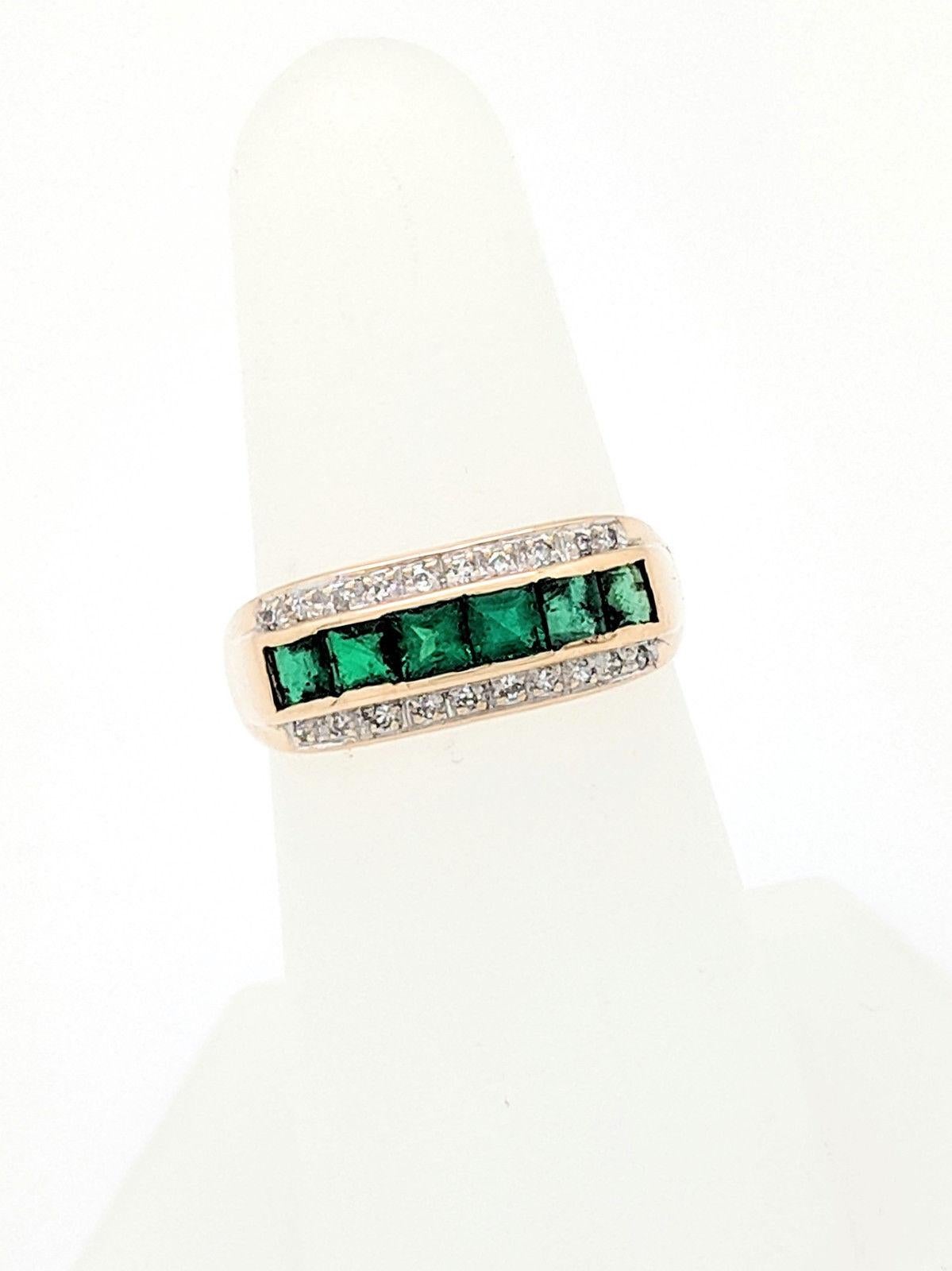 Contemporary 18 Karat Yellow Gold Emerald and Diamond Ring