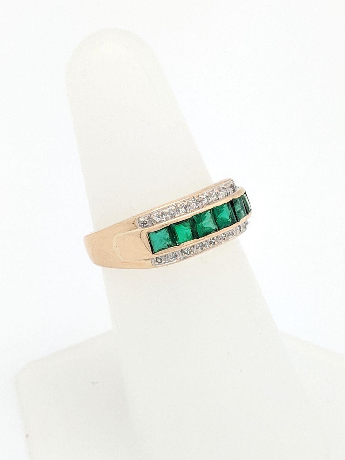 Women's 18 Karat Yellow Gold Emerald and Diamond Ring