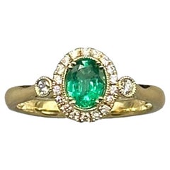 18 Karat Yellow Gold Emerald and Diamond Ring