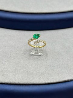Bague serpent en or jaune 18 carats avec émeraudes et diamants
