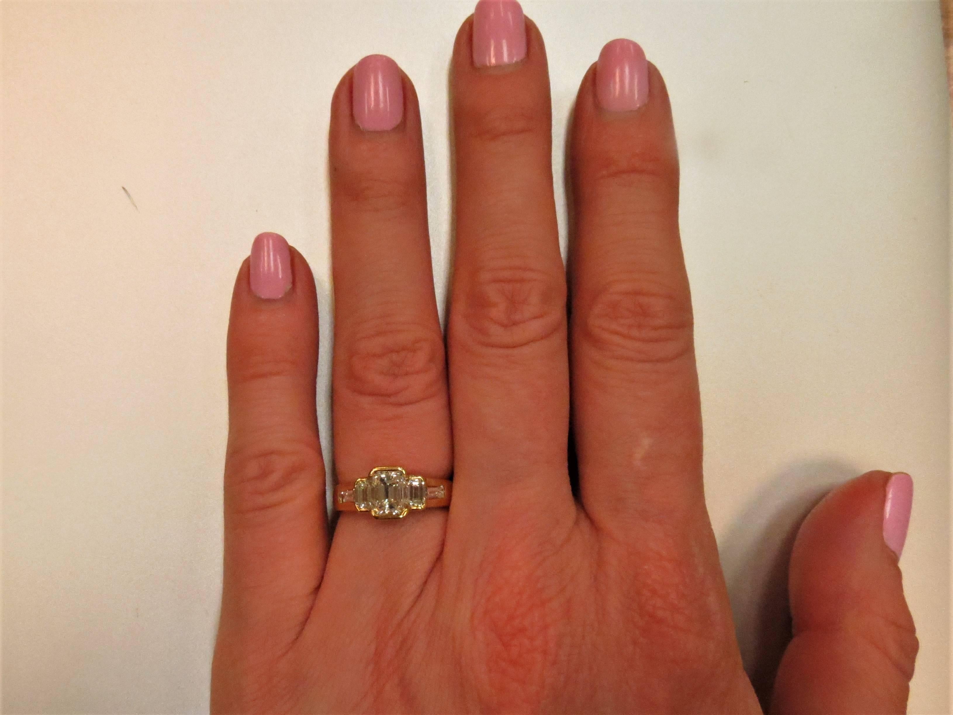 Contemporary 18 Karat Yellow Gold Emerald Cut Diamond Ring For Sale