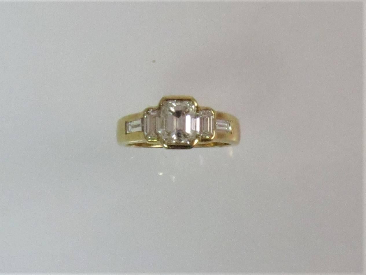 Women's 18 Karat Yellow Gold Emerald Cut Diamond Ring For Sale
