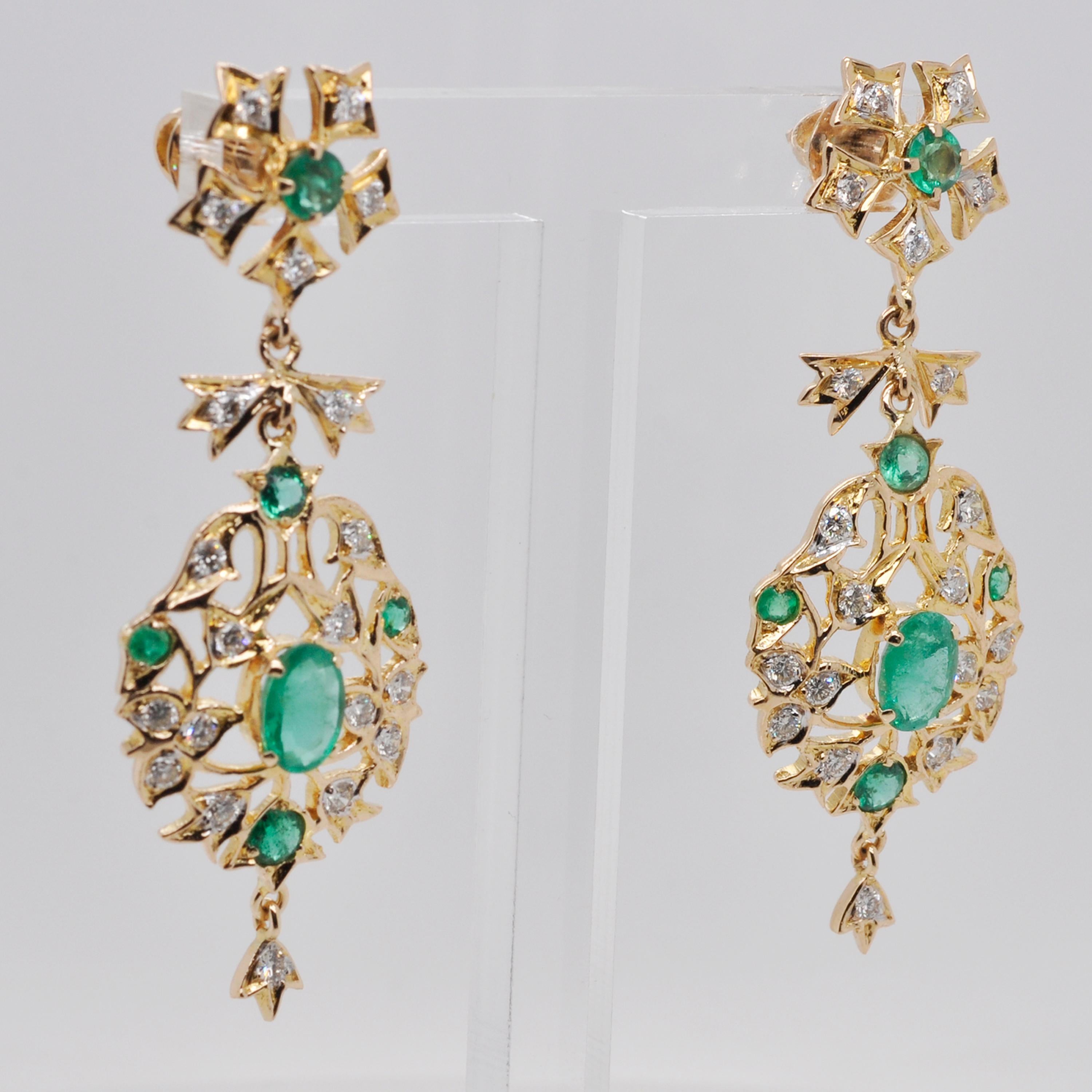 Oval Cut 18 Karat Yellow Gold Emerald Diamond Dangle Earrings