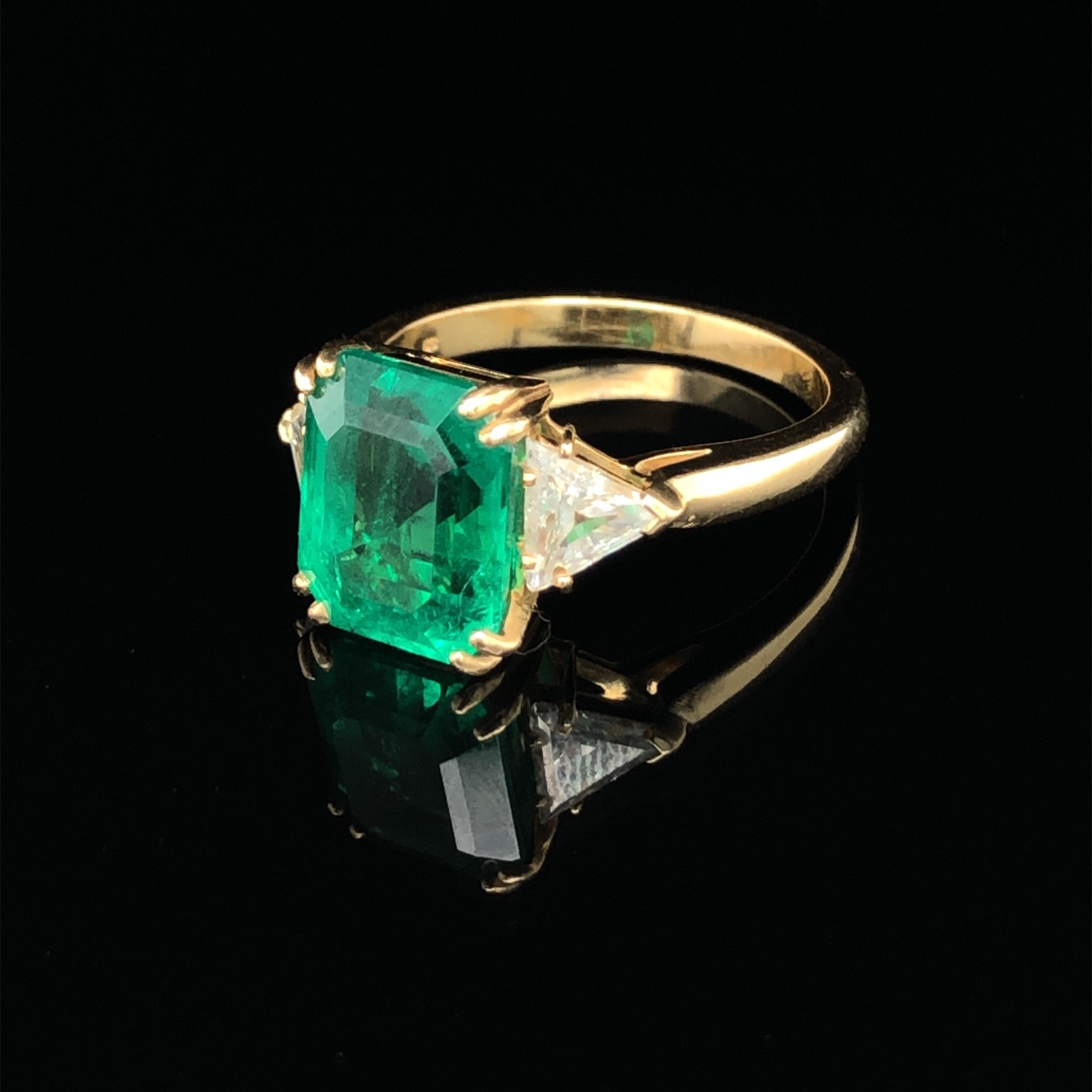 Women's 18 Karat Yellow Gold Emerald Diamond Three Stone Ring by Boucheron