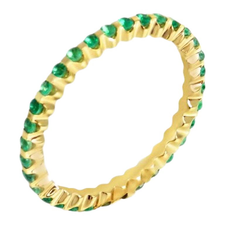 18KT Yellow Gold Emerald Garavelli  Band RING.
GOLD gr : 1,08
Emeralds set all around total ct : 0,48
Size: european 53;  american 6.5
Any different size available as an order with delivery 4 weeks.
Also available upon order in yellow or pink