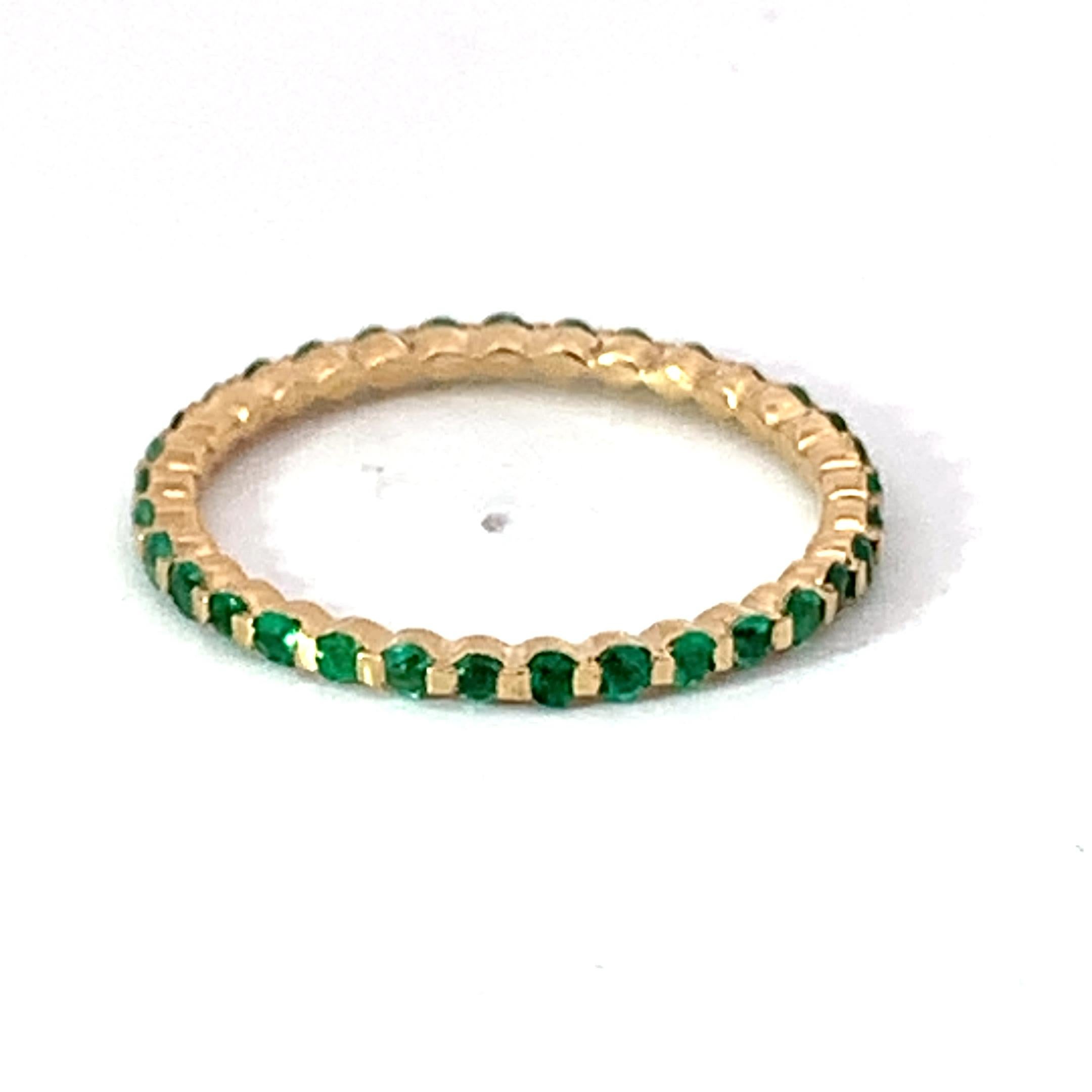 18 Karat Yellow Gold Emerald Garavelli Band Ring For Sale 1