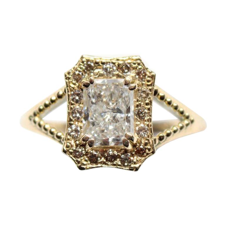 18 Karat Yellow Gold Emerald Halo Diamond Ring
