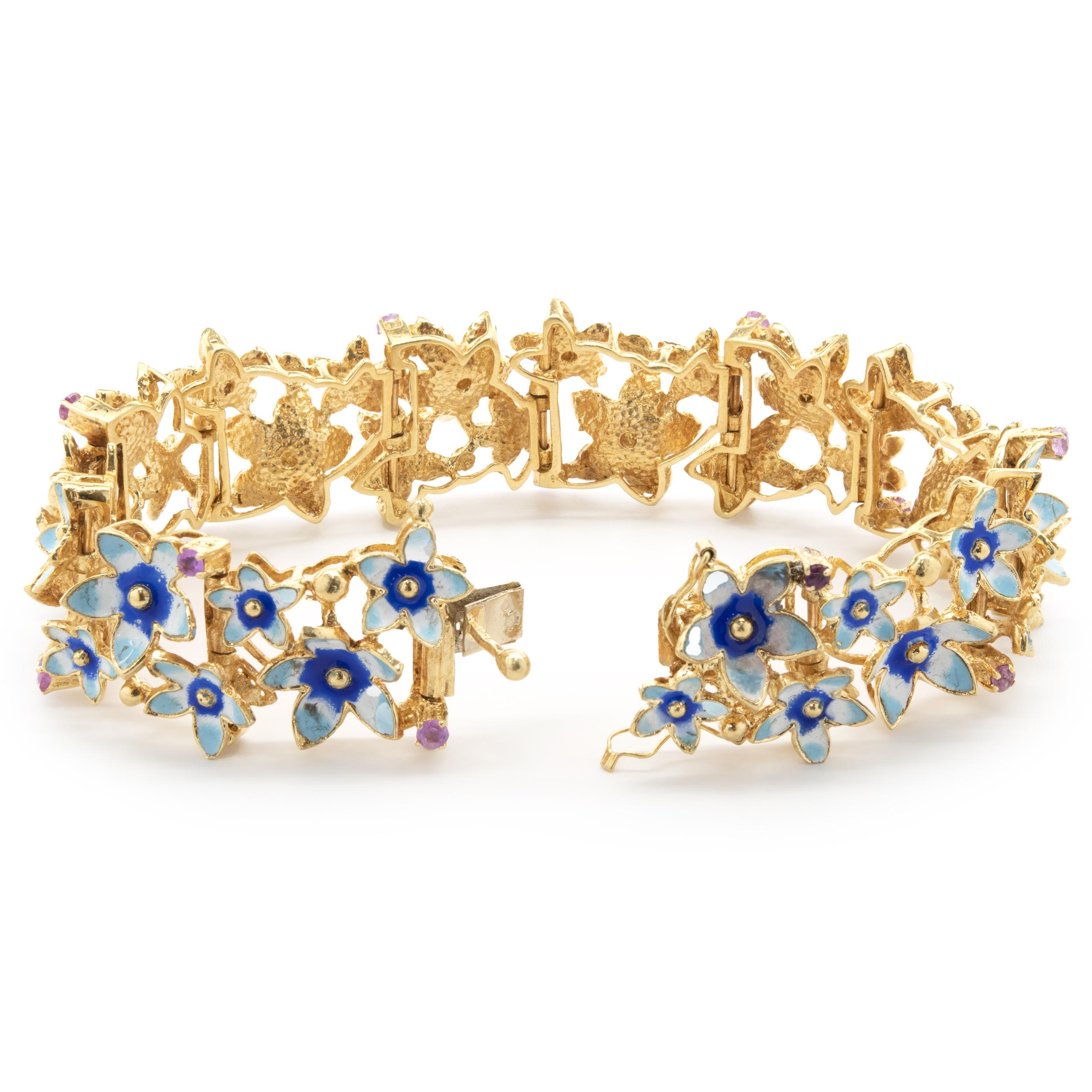 Designer: custom
Material: 18K yellow gold
Weight: 36.73 grams
Dimensions: bracelet measures 6.5-inches in length
