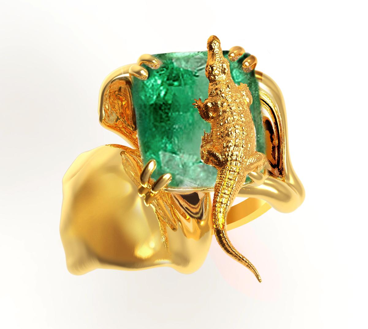 Cette bague de fiançailles contemporaine Eden en or jaune 18 carats est incrustée d'émeraude naturelle, 2 carats. La taille de la fleur est de 2 cm, et la bague fait partie de la Collection Mésopotamienne conçue par la peintre à l'huile et créatrice