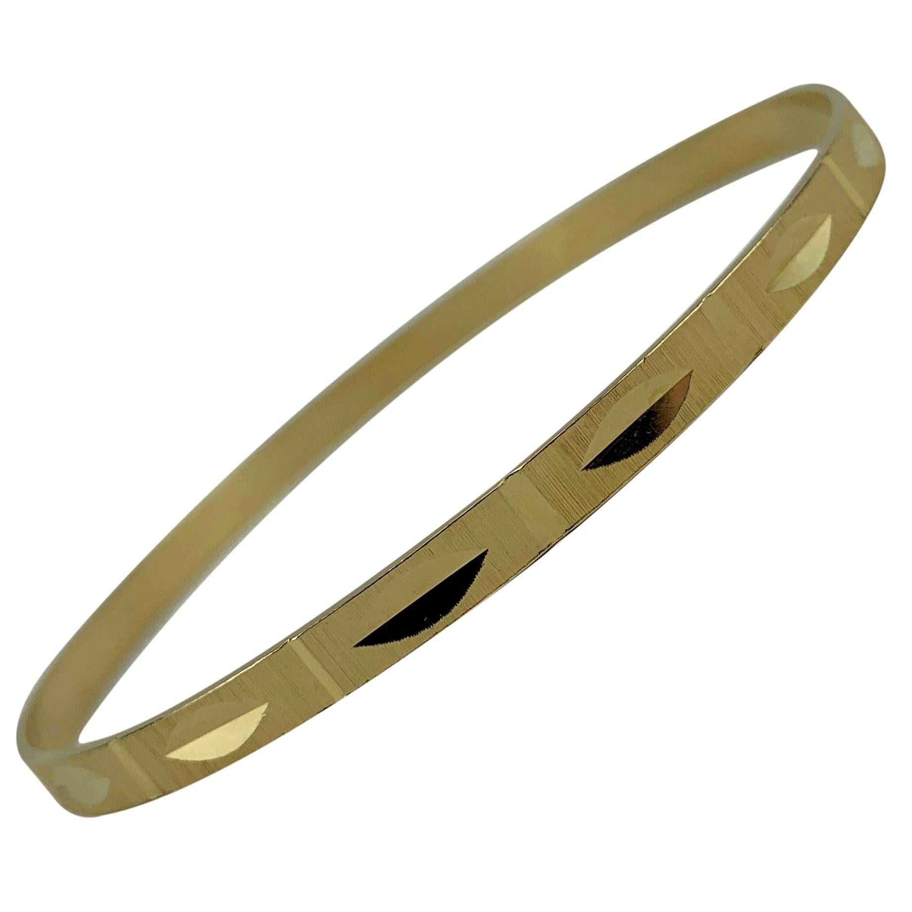 18 Karat Yellow Gold Etched Diamond Cut Bangle Bracelet
