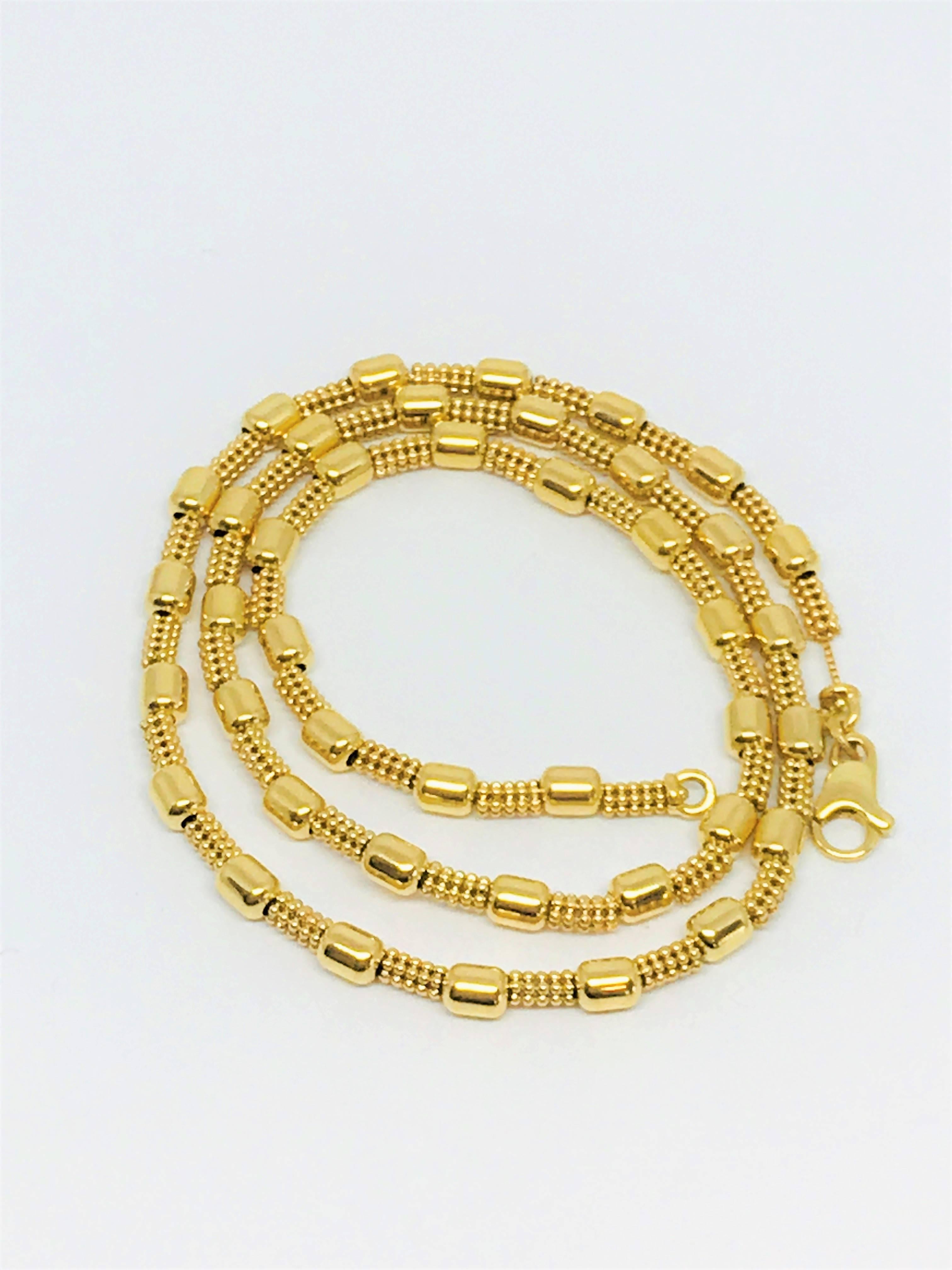 Beautiful classic style, 18k Yellow Gold Fancy Bead Chain necklace. Perfect for everyday!
Length of chain is 18 inches
Weight is 18.89 grams
Hallmarked - 1 AR 750 IND UNOAERRE