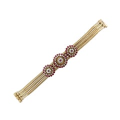 Bracelet multibrins en or jaune 18 carats avec rubis fantaisie et diamants