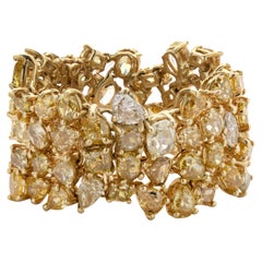 18 Karat Yellow Gold Fancy Yellow Multi Shape Diamond Flex Band