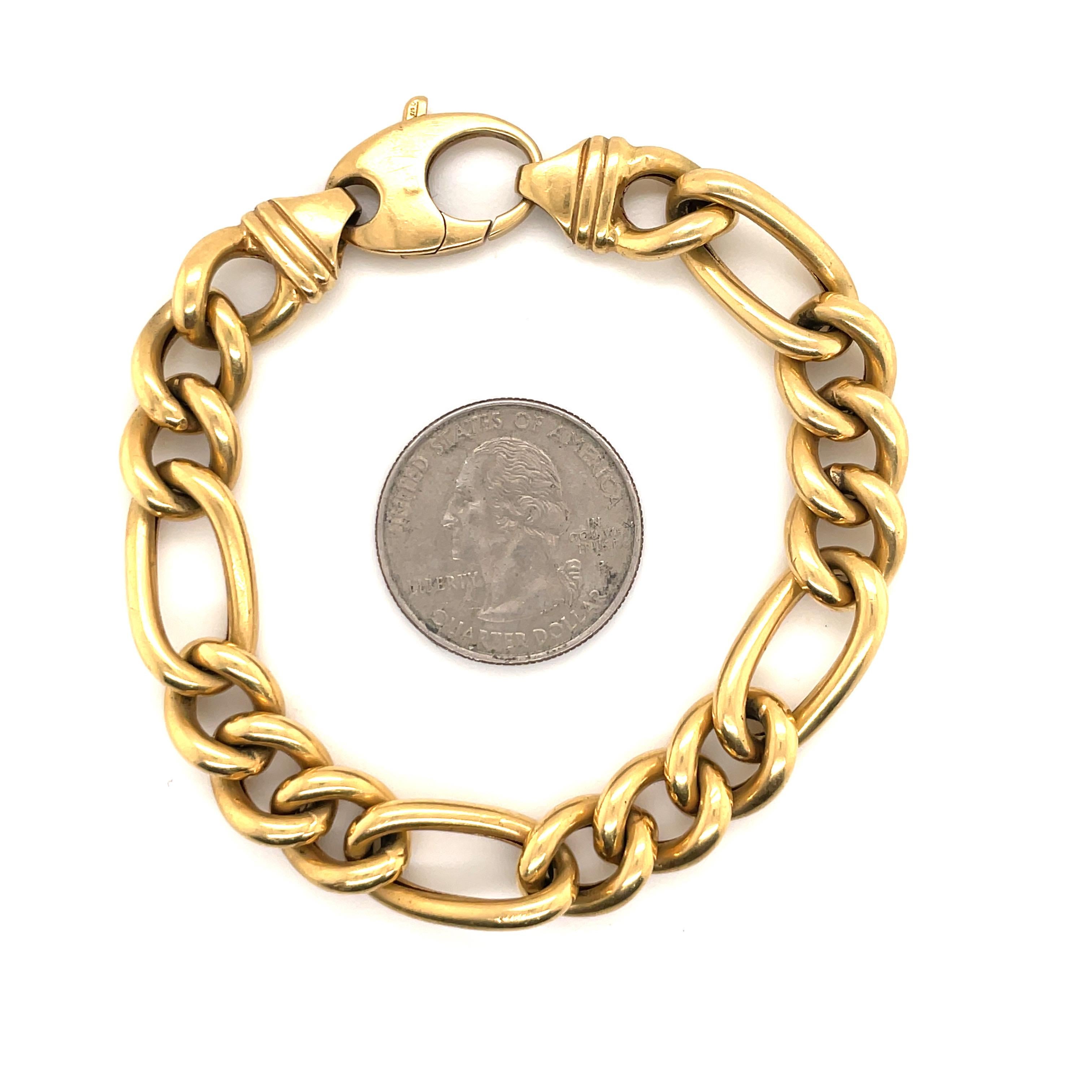 18 Karat Yellow Gold bracelet featuring a Figaro link weighing 27.1 grams. 
Great to layer or wear alone!