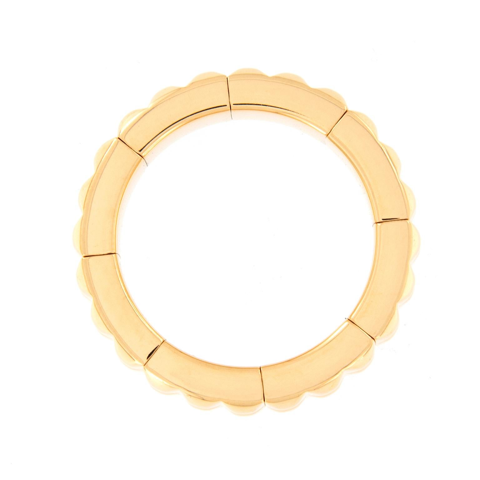 This contemporary flexible band ring is designed for comfort and perfectly fits one’s finger. The ring is crafted in 18k yellow gold and band can stretch up to 1.5 in size. The ring is great for stacking and would complement an engagement ring. Ring