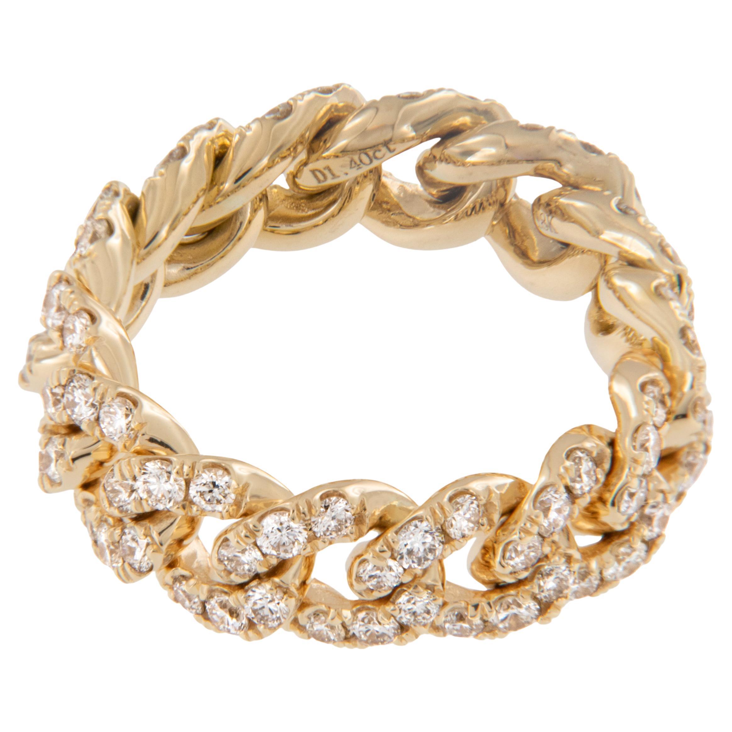 Absolutely on trend! This ever popular Cuban link ring is crafted in rich, solid 18 karat yellow gold and is flexible for ultimate comfort! Diamond pave' all the way around with 84 shimmering diamonds = 1.40 Cttw (VS - G-H) for sparkle in every