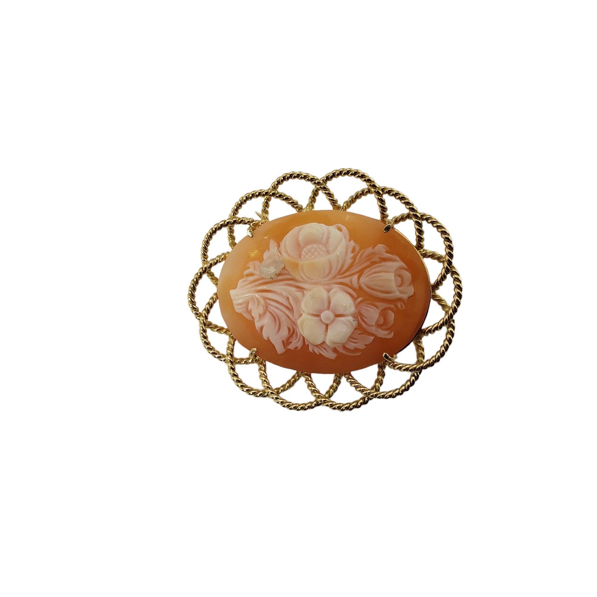 Vintage 18 Karat Yellow Gold Floral Cameo Brooch/Pin-

This stunning floral cameo brooch is framed in beautifully detailed 18K yellow gold.

Size: 38 mm x 33 mm

Weight: 4.8 dwt. / 7.6 gr.

Tested 18K gold.

Very good condition, professionally