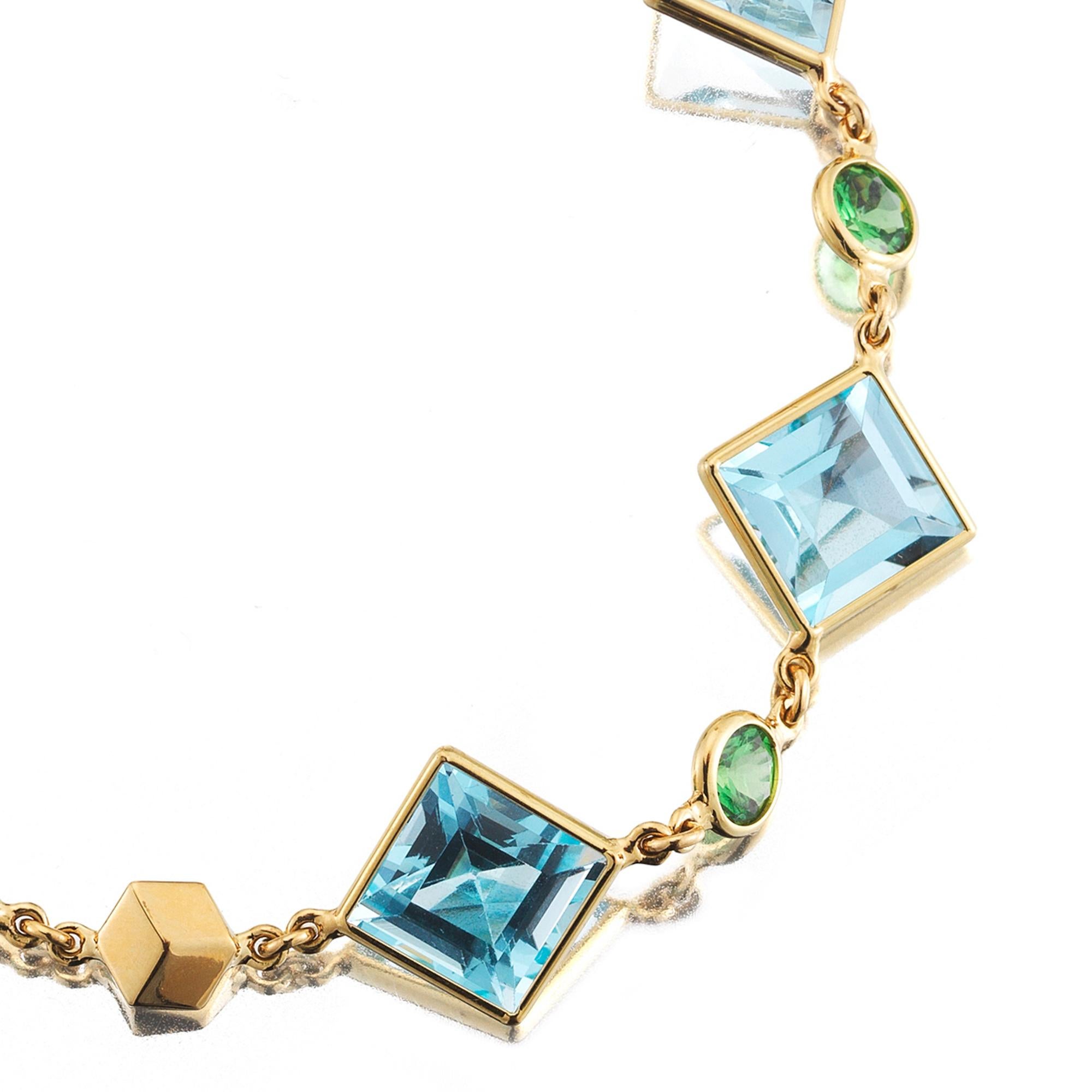 Emerald Cut Paolo Costagli 18K Yellow Gold Florentine Bracelet with Blue Topaz & Tsavorites For Sale