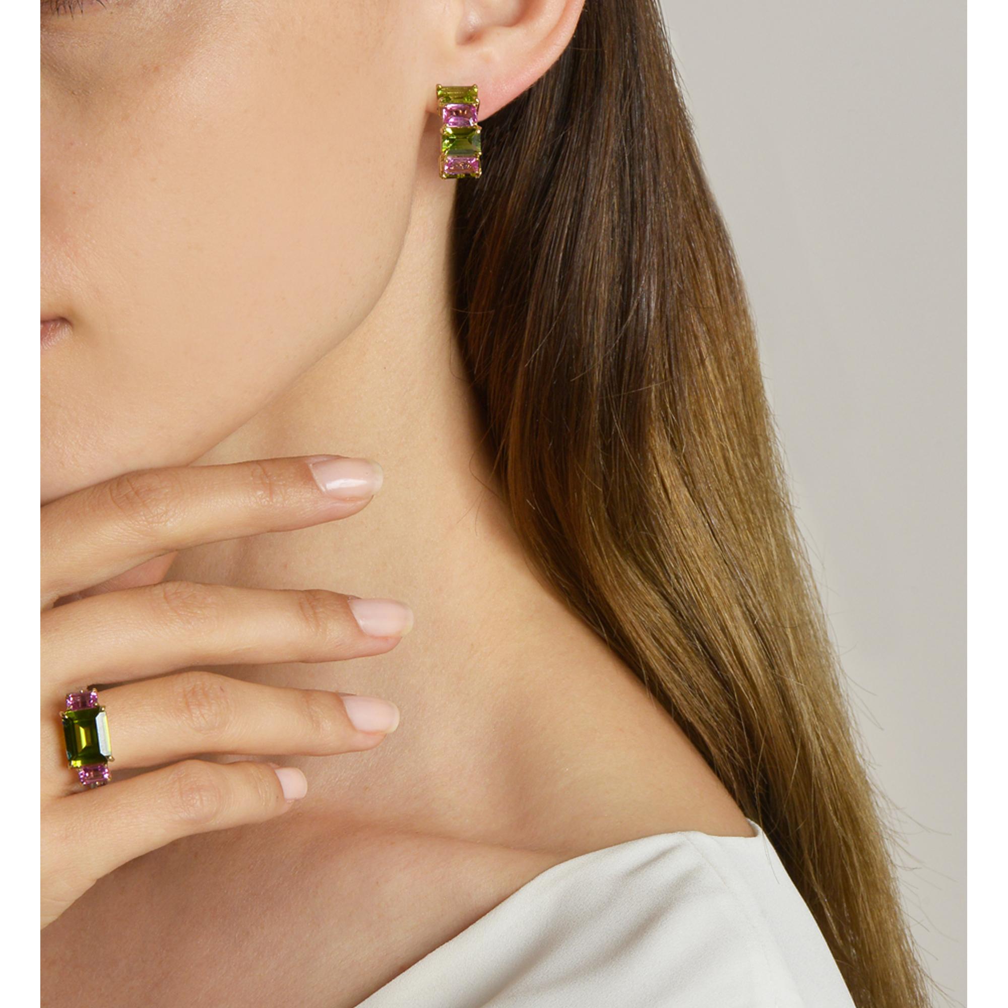 18kt yellow gold Florentine earrings set with emerald-cut peridots and pink sapphires.

Inspired by the Garden of the Iris, the Florentine collection pairs bold color combinations of geometric gemstones to translate Paolo Costagli's memories of