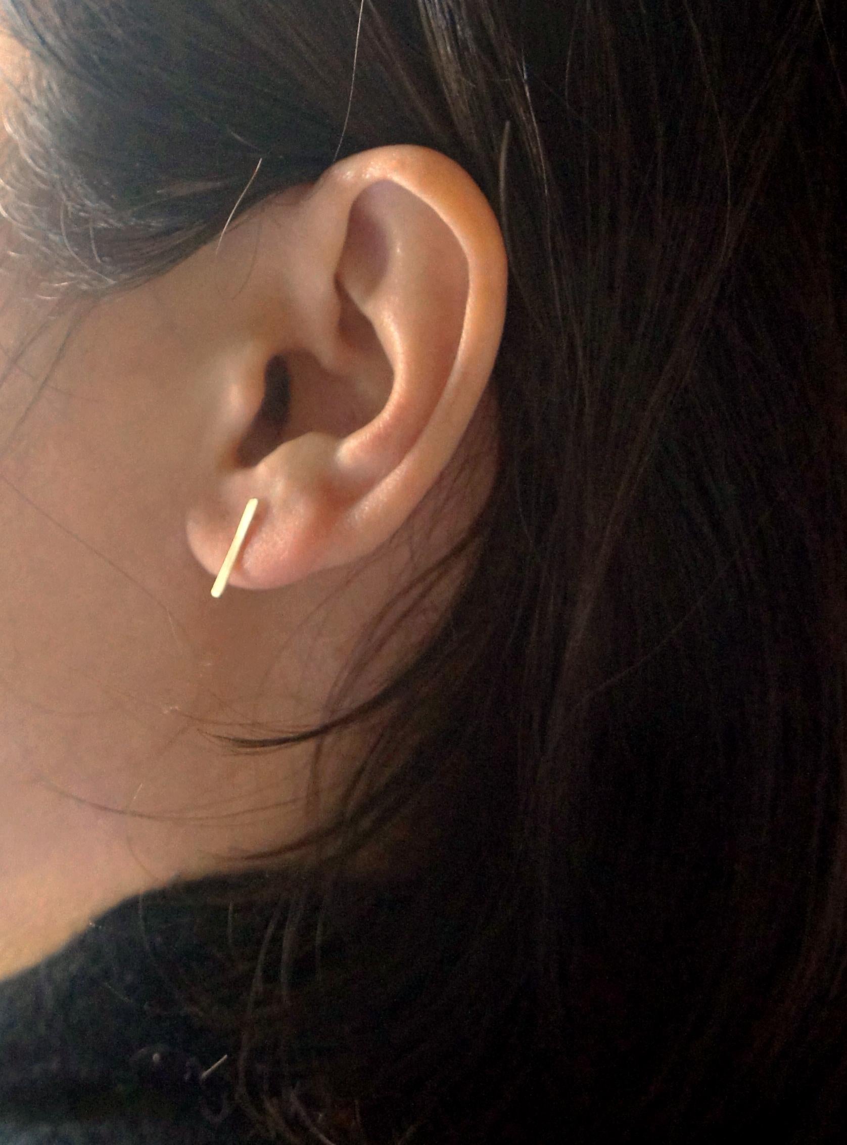 The Detail
Making Marks 18-karat yellow gold studs. 
Making Marks is a collection with maker's hand Forging marks and brushed texture.
Minimal and playful collection is perfect for everyday wears and nice gifts choices. 
These earrings come as a