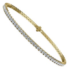 Bracelet tennis à quatre griffes en or jaune 18 carats et diamants de 3 carats