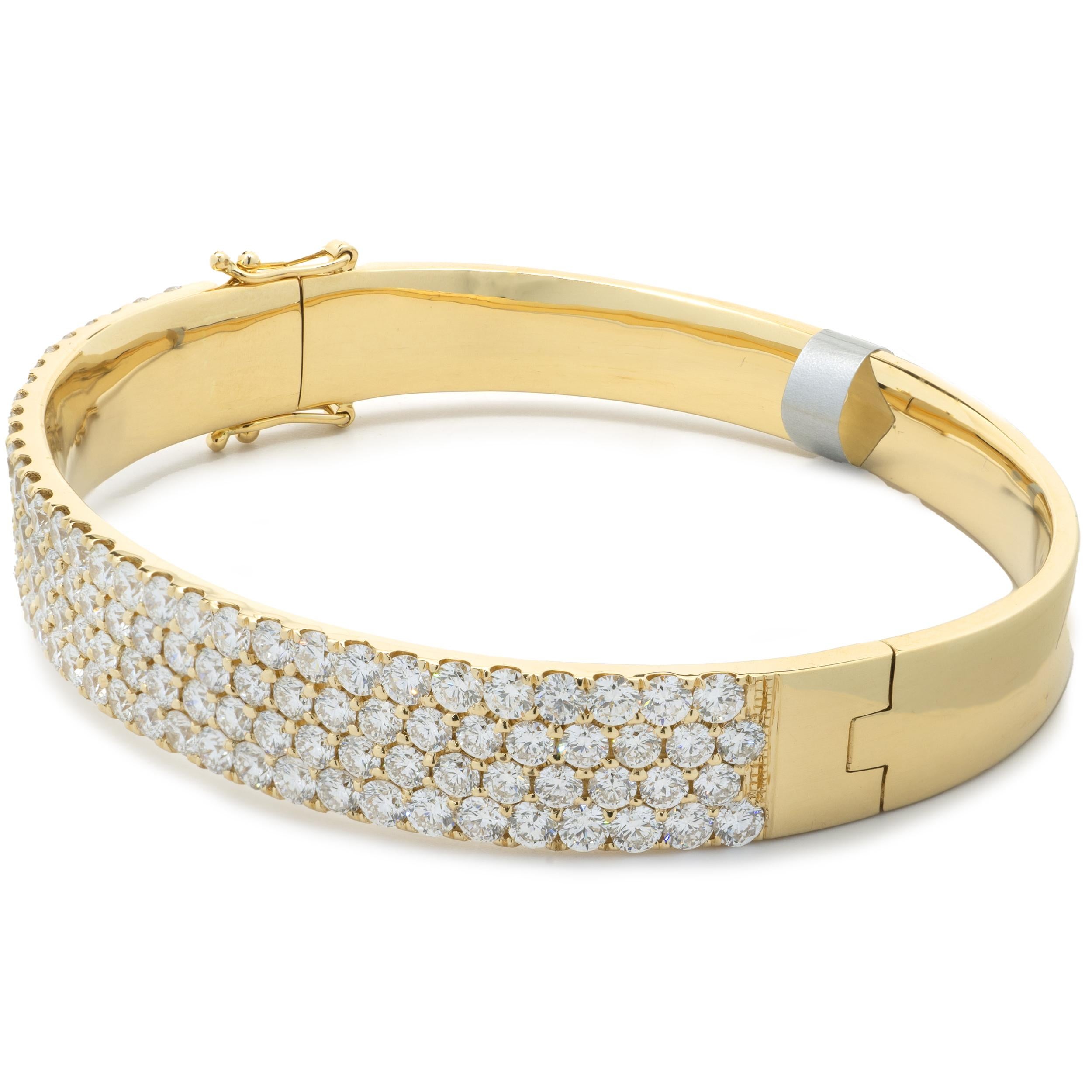 Designer: custom
Material: 18K yellow gold
Diamonds: 130 round brilliant cut = 8.02cttw
Color: G
Clarity: VS1
Dimensions: bracelet will fit up to a 7.5-inch wrist
Weight: 46.80 grams