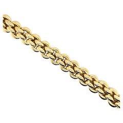 Bracelet à quatre rangées de maillons en or jaune 18 carats, 42.2 grammes, fabriqué en Italie