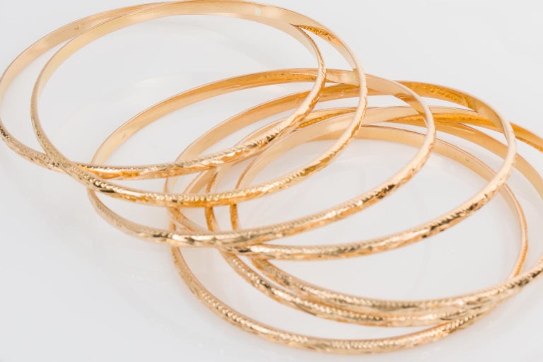 18 Karat Yellow Gold French Antique Semaine Engraved Bangle Set For