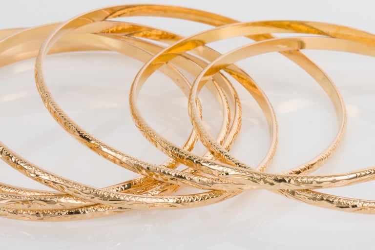 18 Karat Yellow Gold French Antique Semaine Engraved Bangle Set For