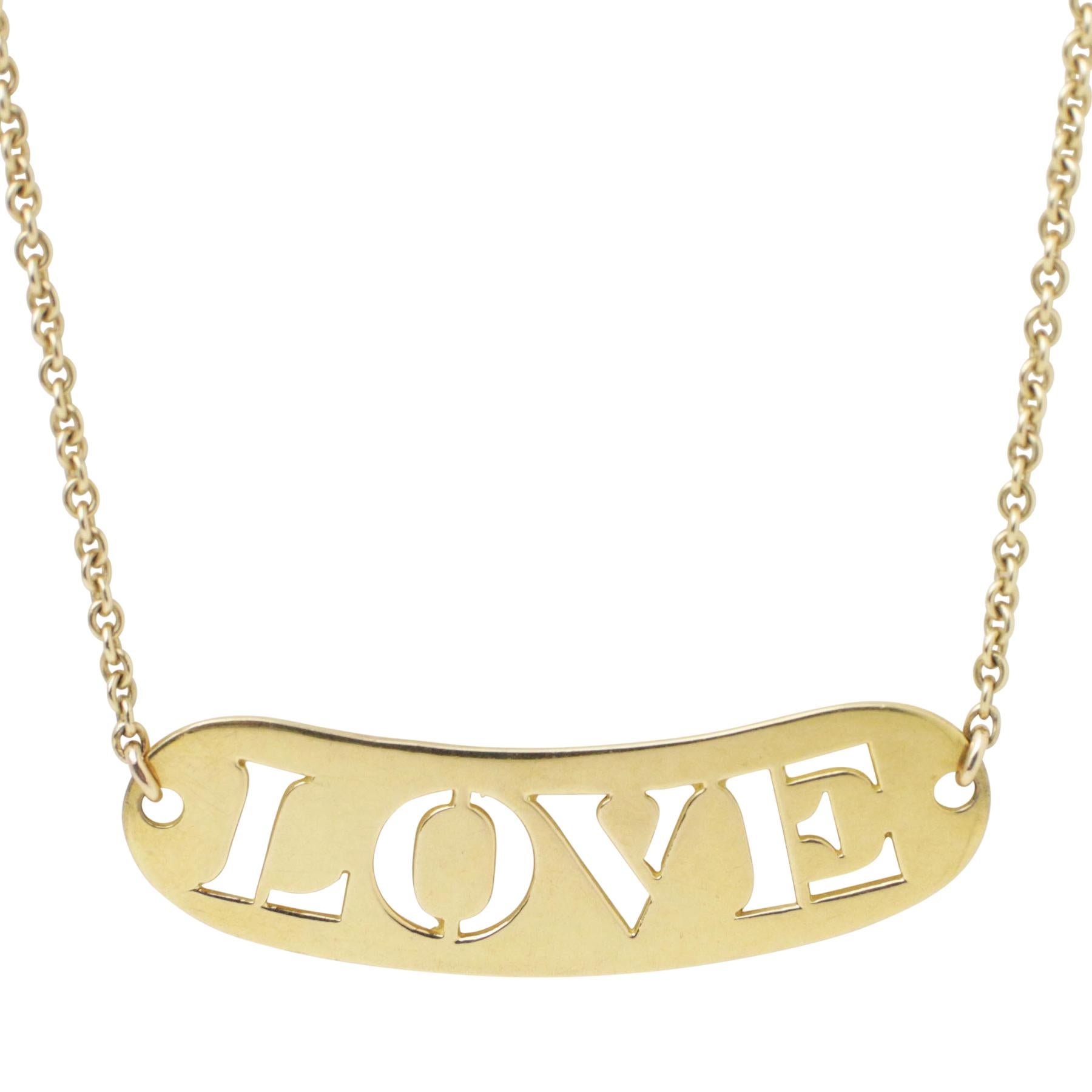 Gold & French, two words that conjure up luxury and style. This 18k yellow gold Love pendant is wearable everyday, perfect on its own or layered with other pieces. The word love is stamped out of a rounded piece of gold, with a lovely fine link