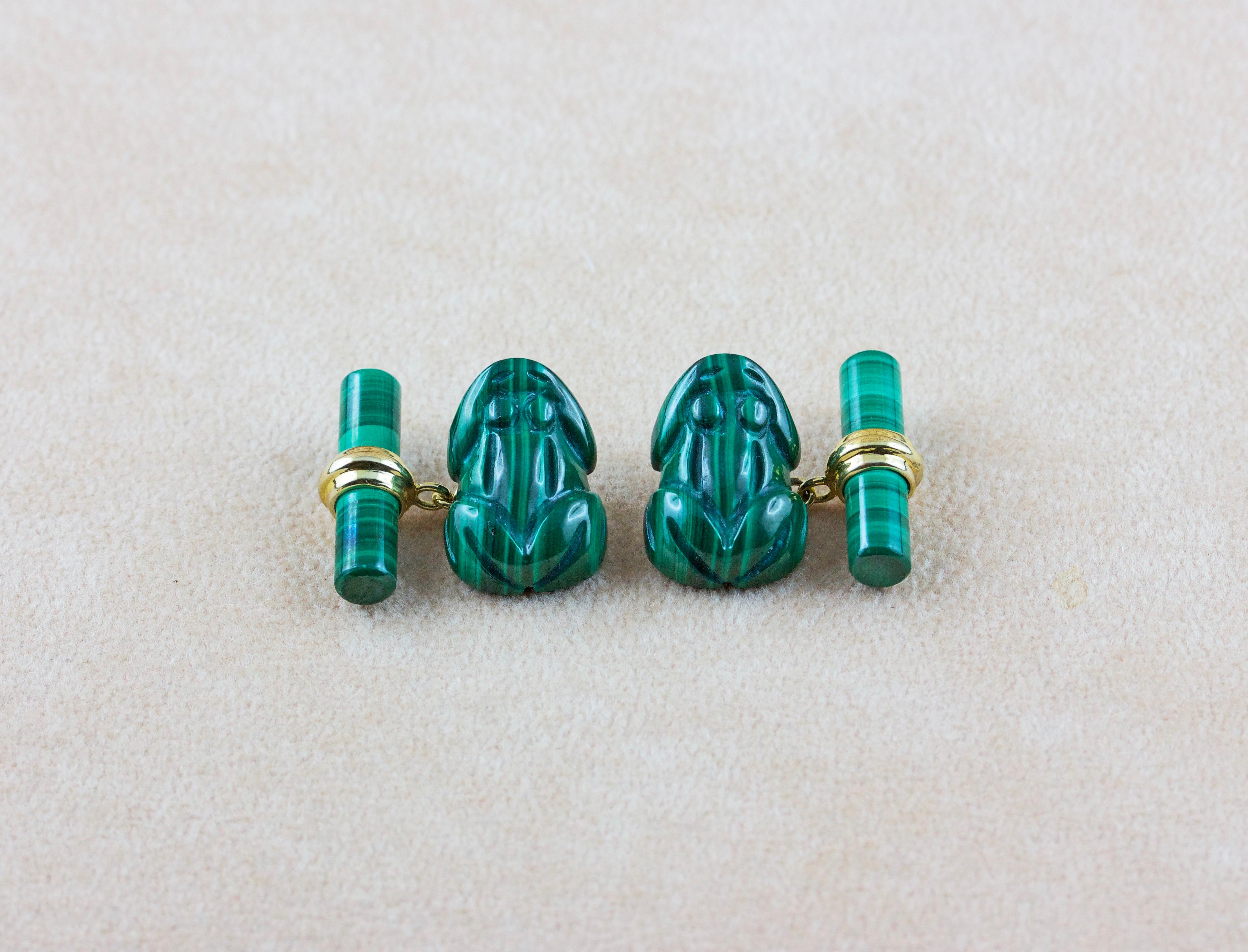 This playful pair of cufflinks is entirely made in malachite and its front face is hand carved to depict the body a frog, also in malachite is made the  back toggle, simple and cylindrical, while an 18k yellow gold post connects these two elements