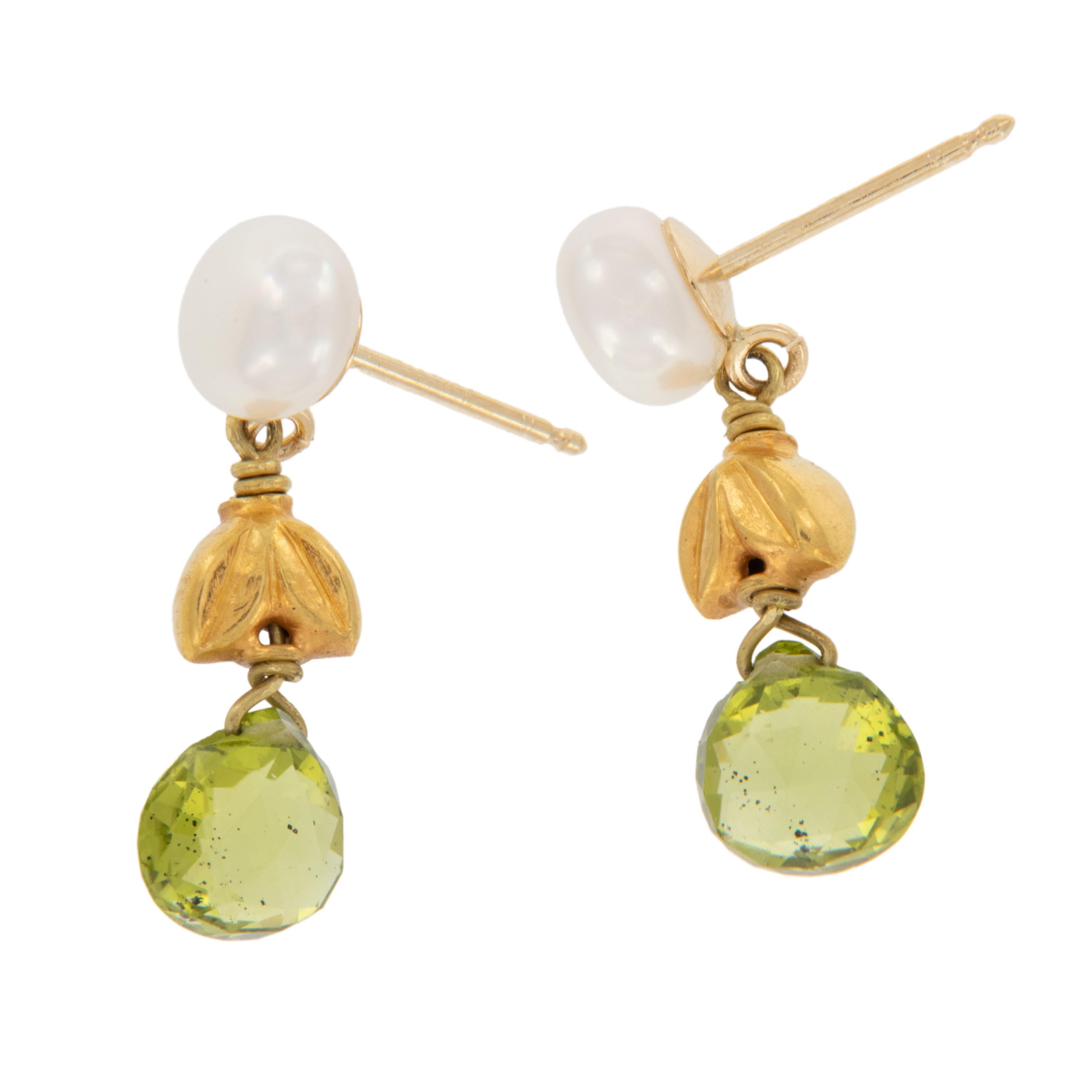 Susan Hoge’s work has been featured in Vogue, Elle, InStyle, Metalsmith and American Craft magazines. She has several pieces in the permanent collection of the Museum of Art and Design in New York City. These beautiful drop earrings are made with a