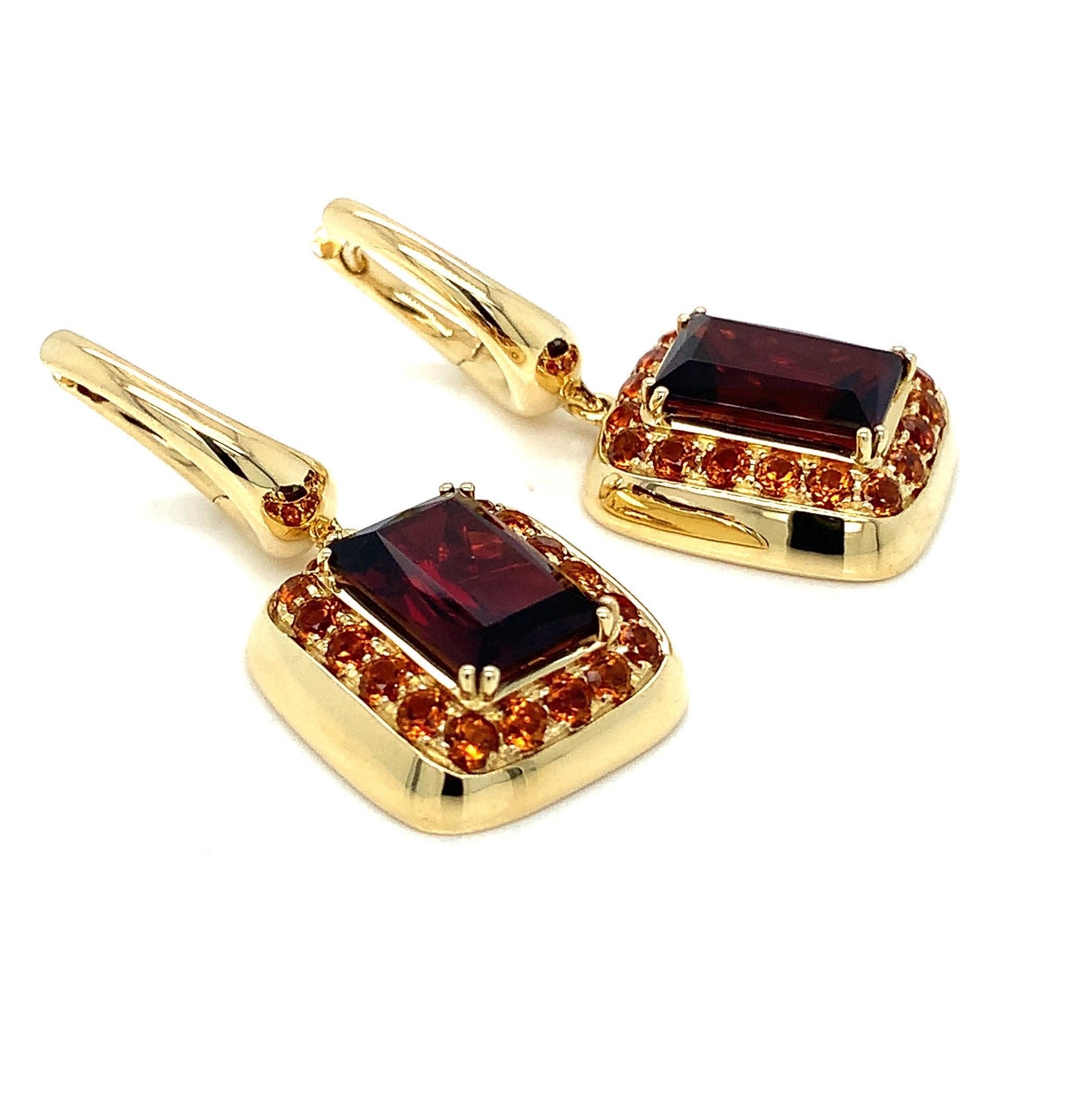 Elevate your style with our exquisite 18-karat yellow gold earrings from the Milano Garavelli collection, featuring   stunning Garnet centerstones and pavé Citrines. Each detail of these earrings reflects the artistry and craftsmanship that Milano
