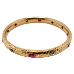 18 Karat Yellow Gold Gemset Engraved Bangle