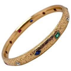 18 Karat Yellow Gold Gemset Engraved Bangle