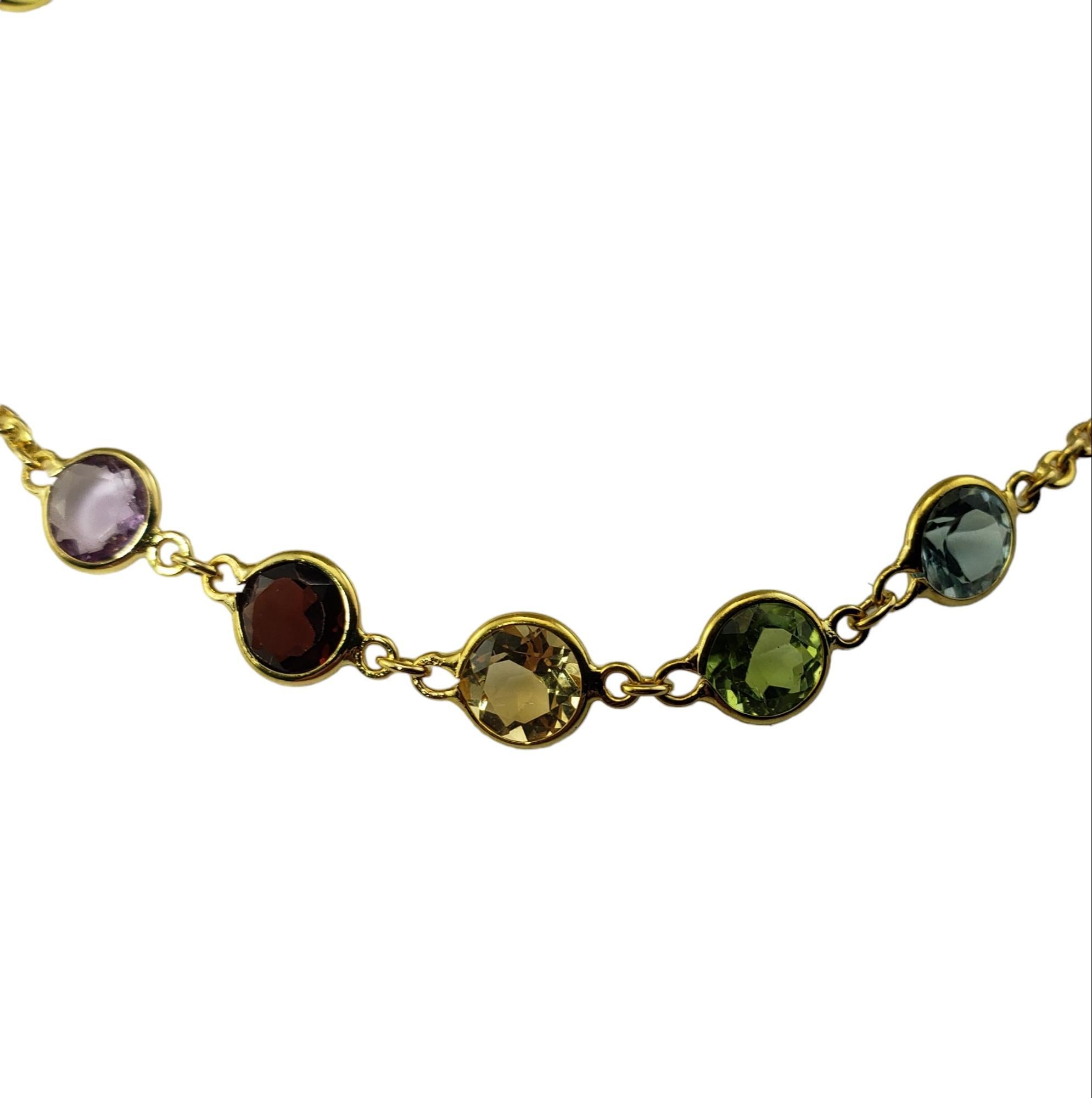Vintage 18K Yellow Gold Gemstone Bracelet JAGi Certified-

This lovely bracelet features blue topaz, amethyst, citrine, peridot and garnet set in classic 18K yellow gold. Width: 5 mm.

Total gemstone weight:  5.7 ct.

Size: 7 inches

Stamped: