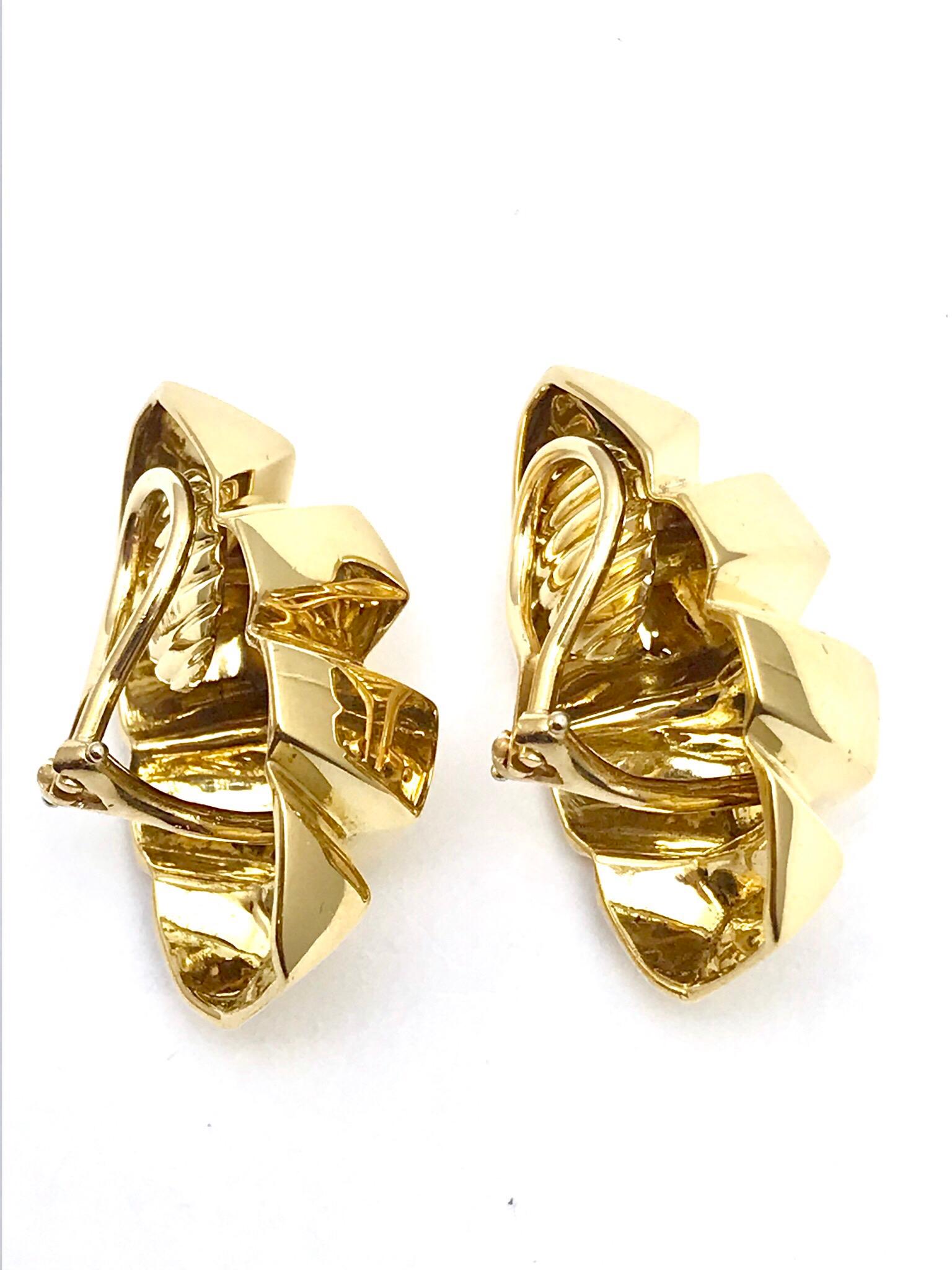 geometric clip on earrings