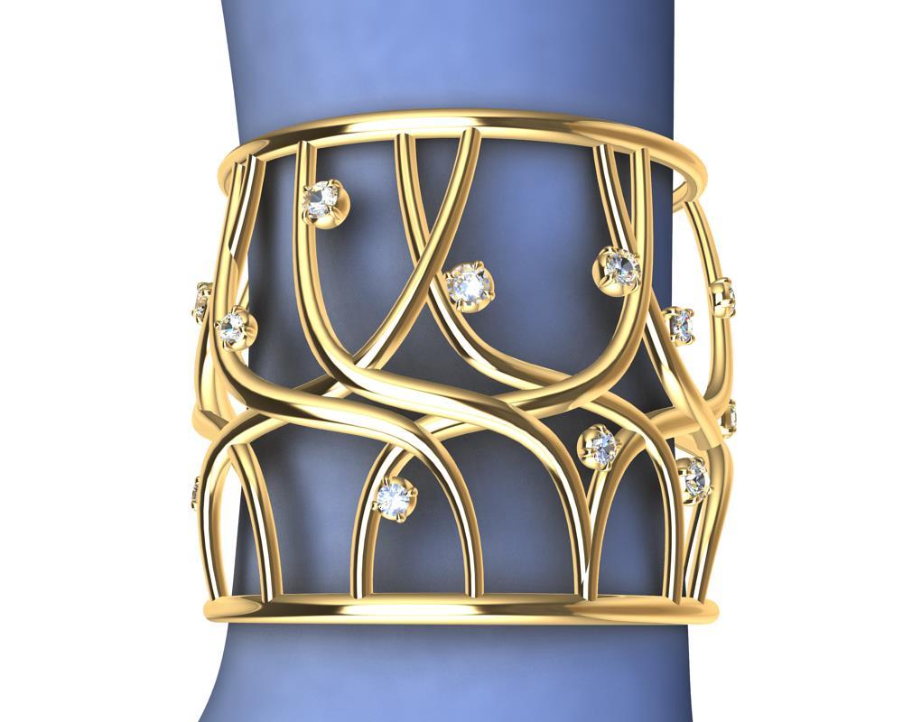 Le designer de Tiffany, Thomas Kurilla, a créé ce bracelet manchette en or jaune 18 carats et diamants. Octobre est le meilleur mois pour lancer le bracelet manchette Octopus.  Calle tous les amoureux de l'océan et des créatures marines. Alors que