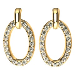 Boucles d'oreilles pendantes en or jaune 18 carats avec diamants