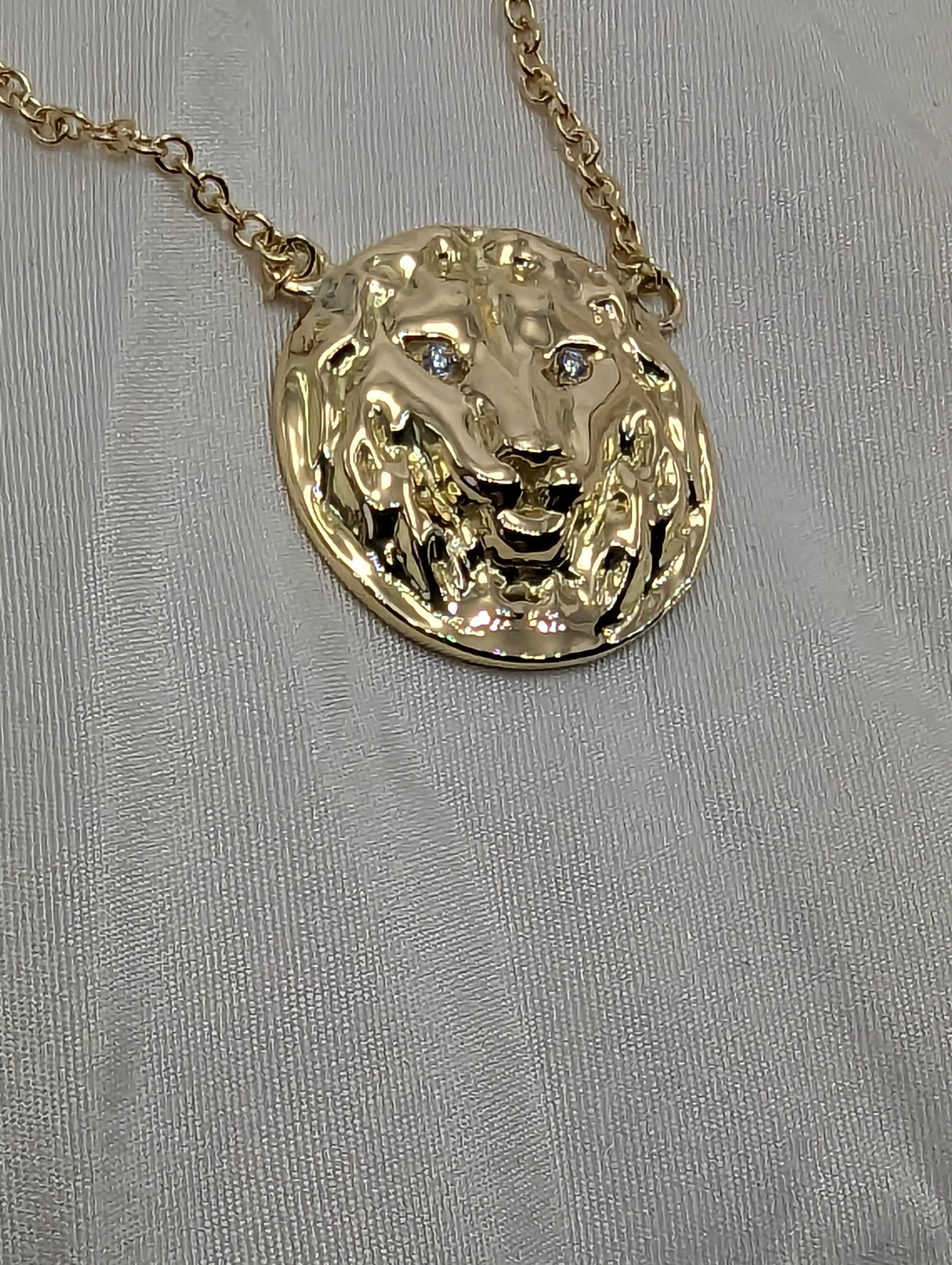 Tiffany Designer, Thomas Kurilla created 18 Karat Yellow Gold GIA Diamond Lion Pendant, 
The king of the jungle. Fearless, territorial, and fighters. Symbolic for many reasons. Now you can get your own and not even bother feeding it! Let it feed