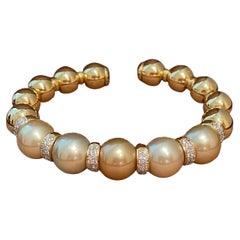 Bracelet / bracelet jonc en or jaune 18 carats avec perles des mers du Sud dorées et diamants